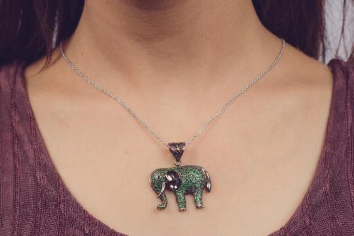 This Lucky Charm Elephant Pendant Micro Pave Tsavorite is meticulously crafted from the finest materials and adorned with stunning tsavorite which helps in attracting money and wealth.
This delicate to statement pendants, suits every style and
