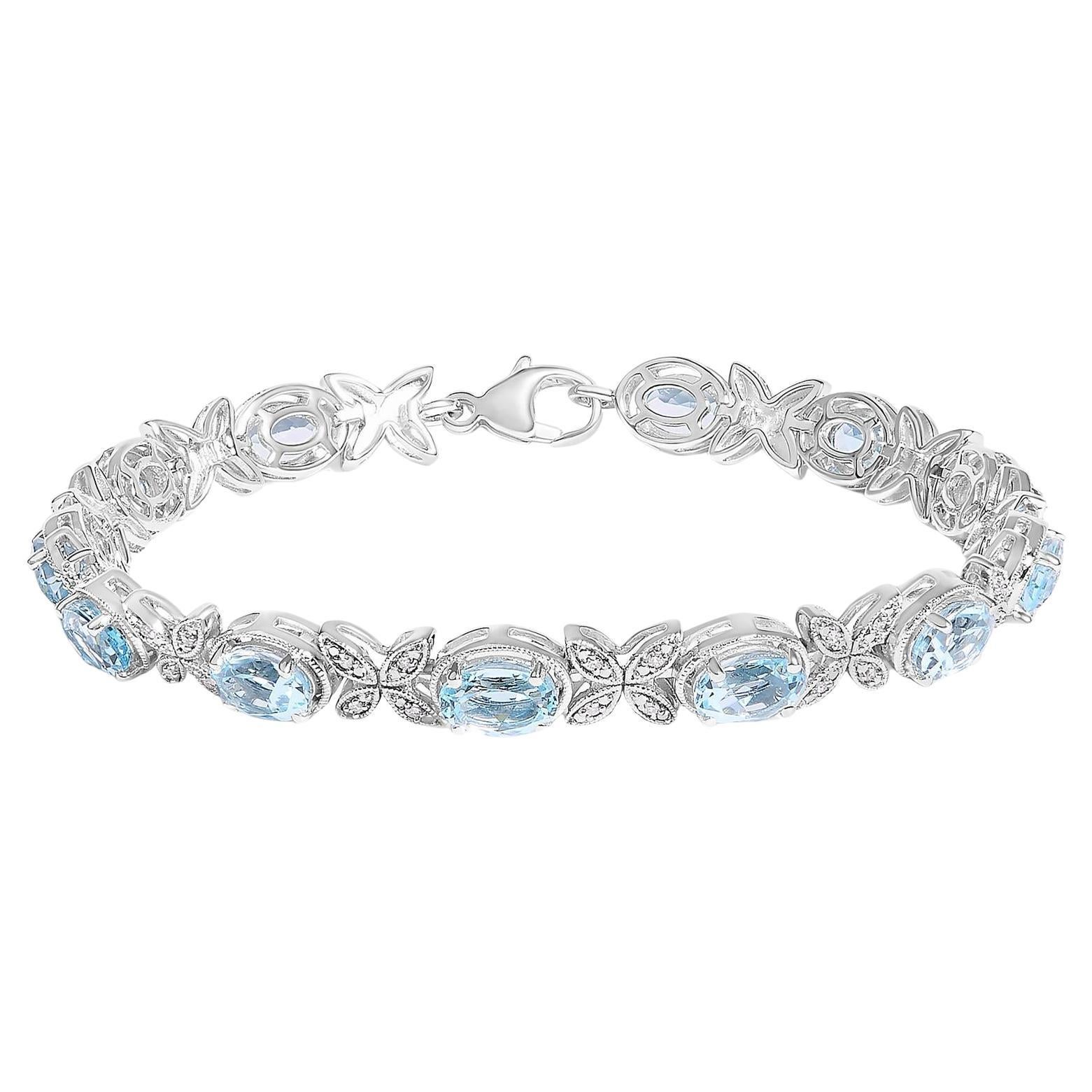.925 Sterling Silver Oval Blue Topaz Diamond Butterfly Link Bracelet