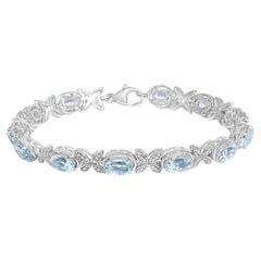 .925 Sterling Silver Oval Blue Topaz Diamond Butterfly Link Bracelet