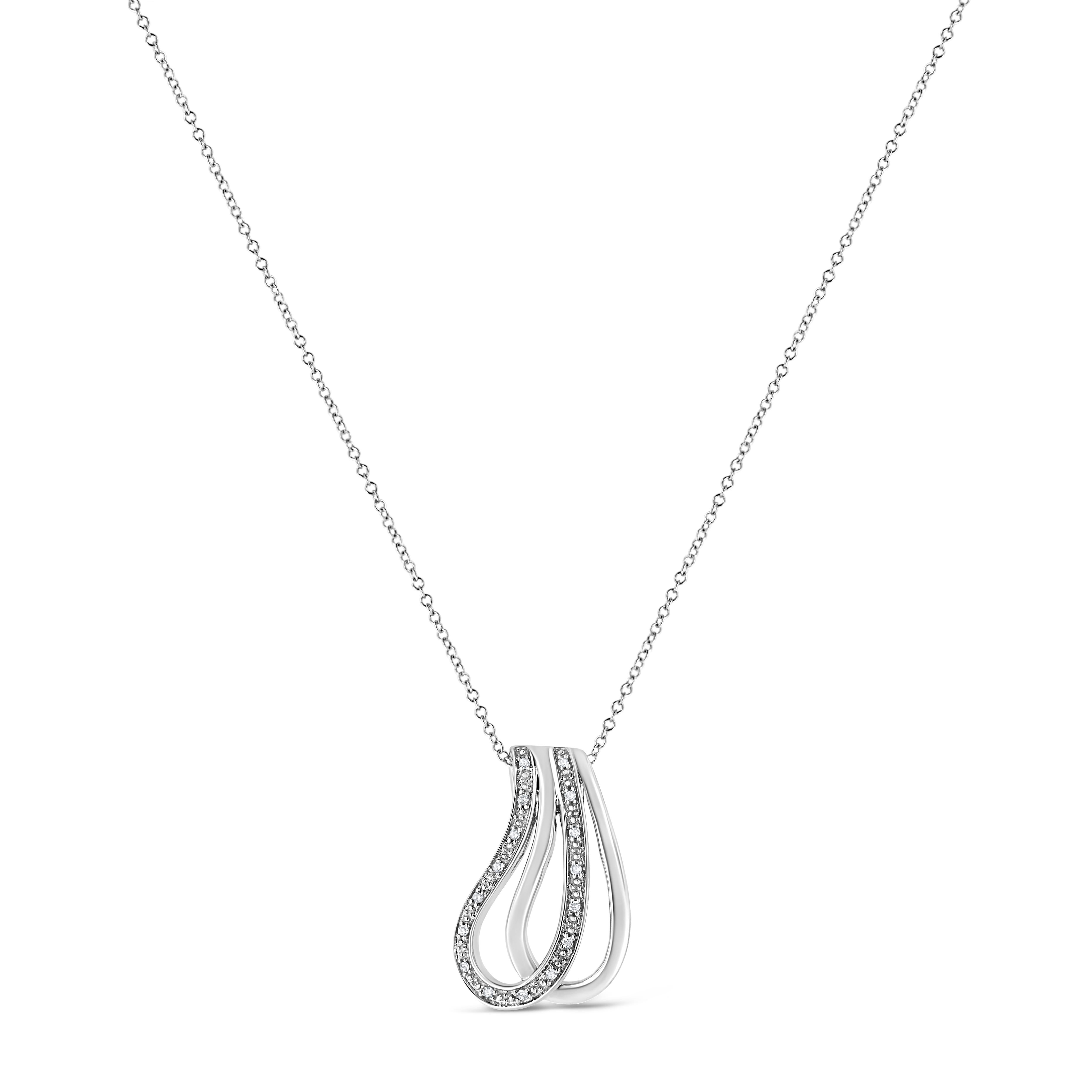 This exquisite diamond pendant will stun the onlookers. Fashioned in lustrous sterling silver this intricately designed pendant showcases two curved lines, one smooth sterling silver and the other sterling silver studded with 16 pave set single cut