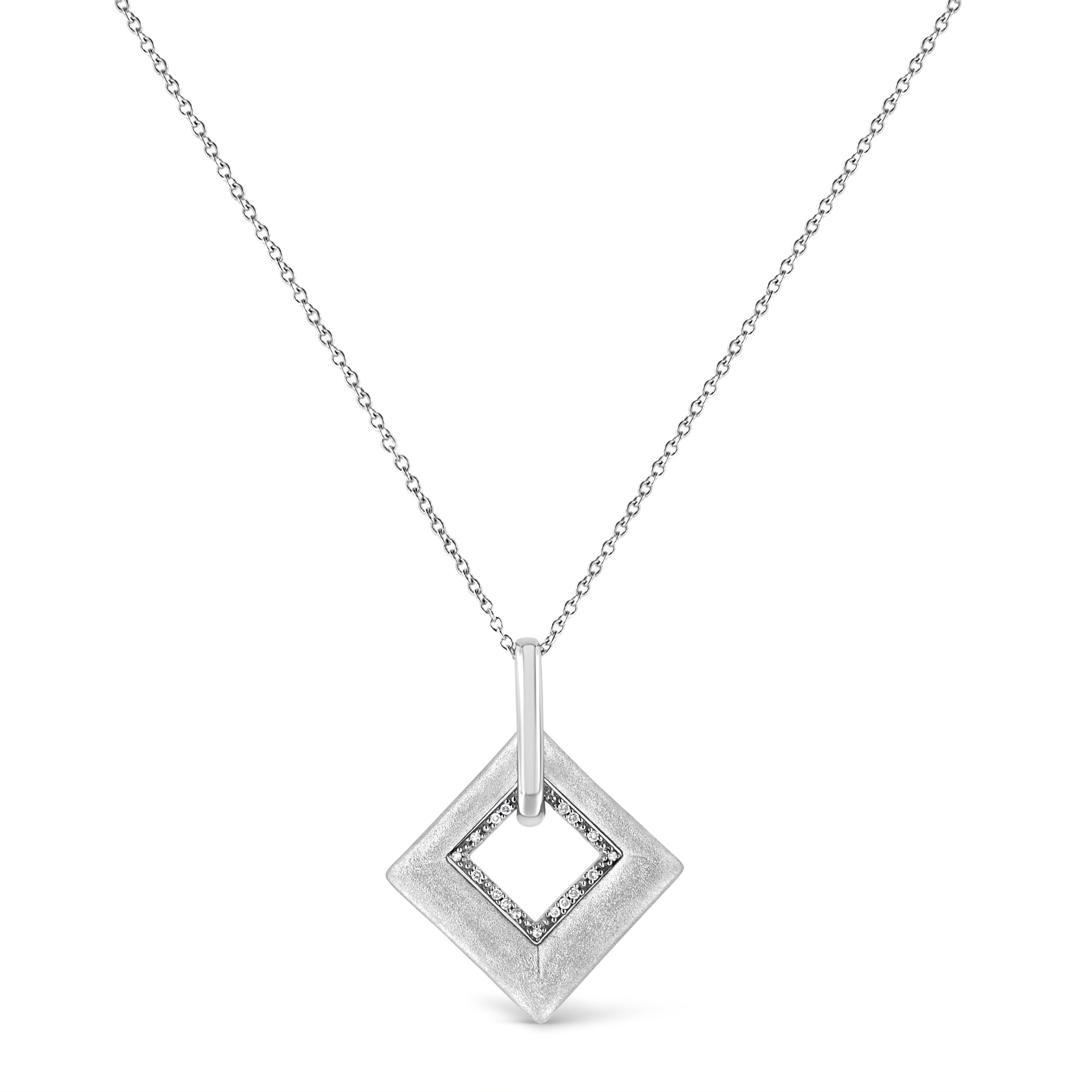 This opulent kite shape diamond pendant adds a spark of eternity to your loved ones style. Gorgeous pendant rendered perfectly on glinting sterling silver showcasing 17 sparkling pave set single cut diamonds, set on kite motif and dangles from a