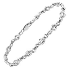 .925 Sterling Silver Prong Set Diamond Accent Curved Spiral Link Bracelet