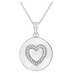 Collana con ciondolo a forma di cuore con diamanti incastonati in argento 925.