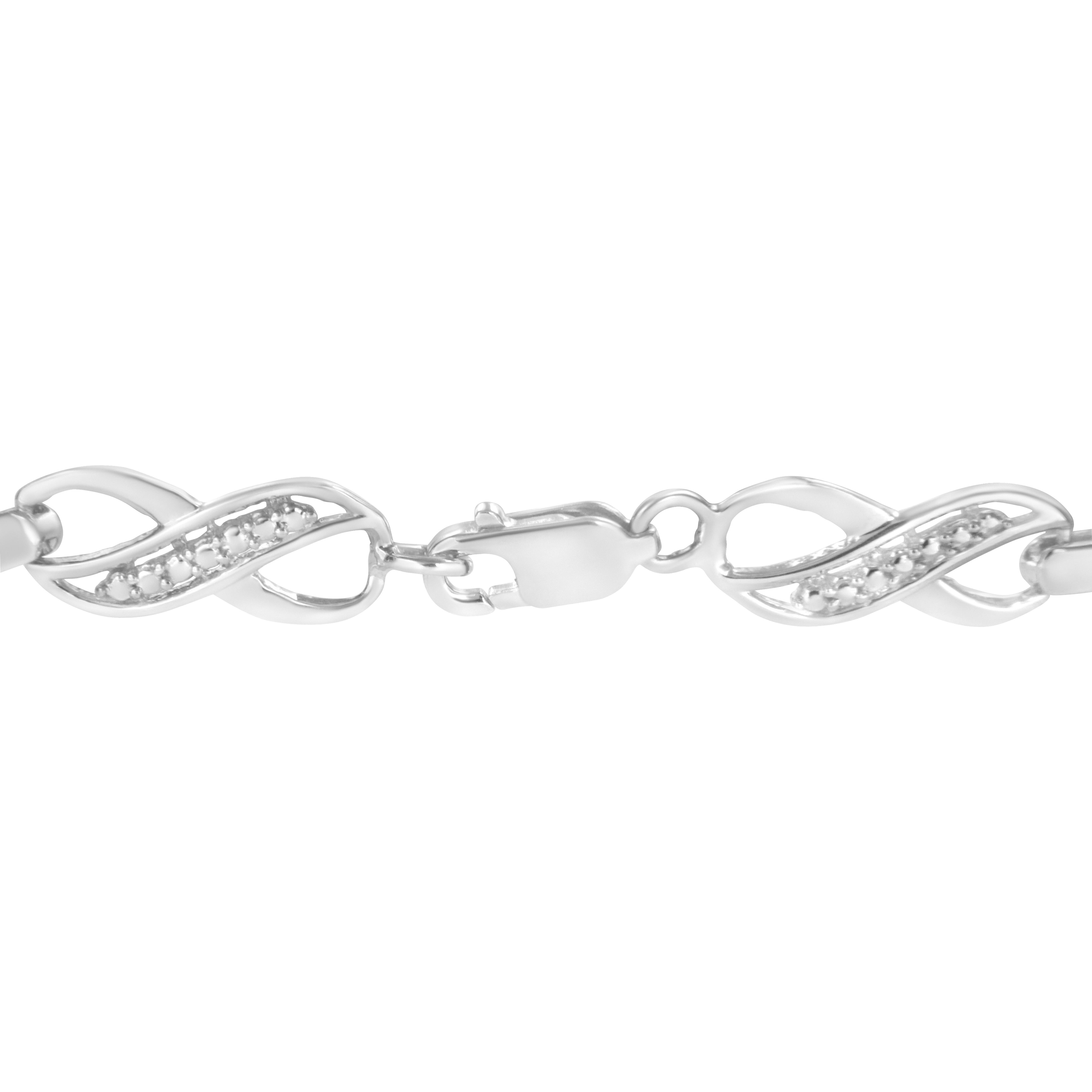 Contemporain Bracelet à maillons Infinity en argent sterling serti d'un ruban de diamants et d'une griffe de 0,925 carat en vente