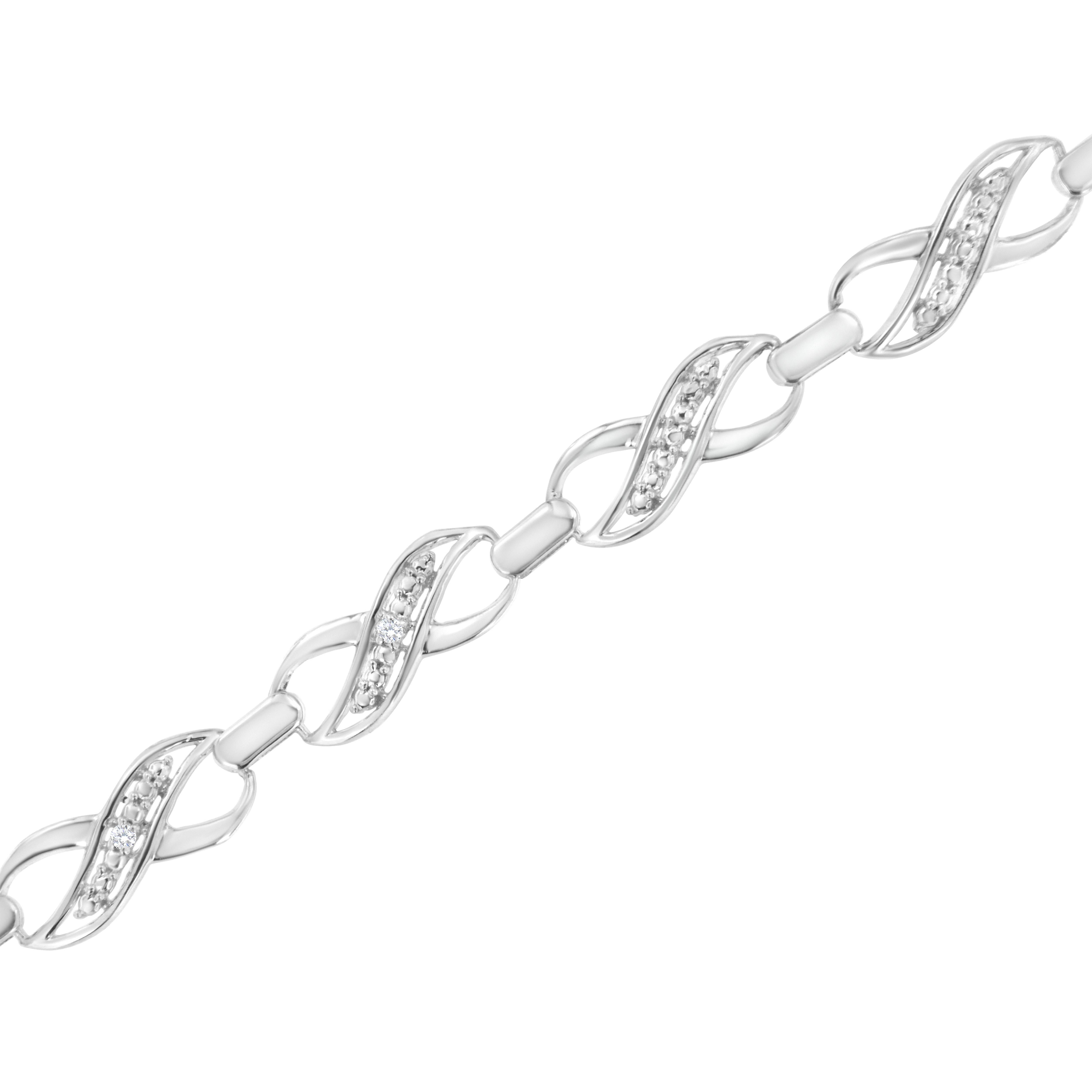 Contemporary .925 Sterling Silver Prong Set Diamond Accent Ribbon and Infinity Link Bracelet For Sale