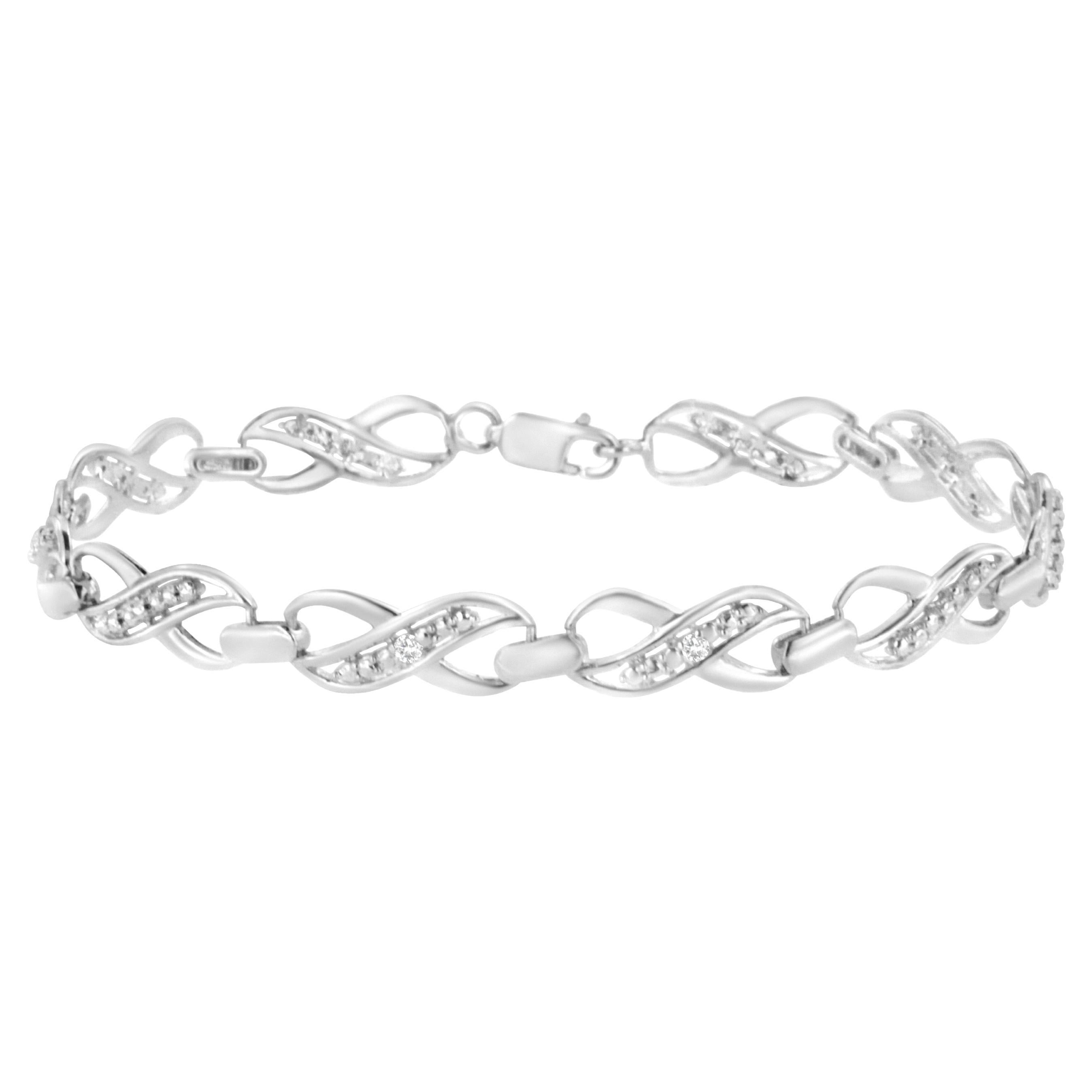 .925 Sterling Silver Prong Set Diamond Accent Ribbon and Infinity Link Bracelet For Sale