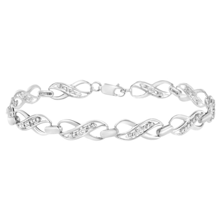 .925 Sterling Silver Prong Set Diamond Accent Ribbon and Infinity Link