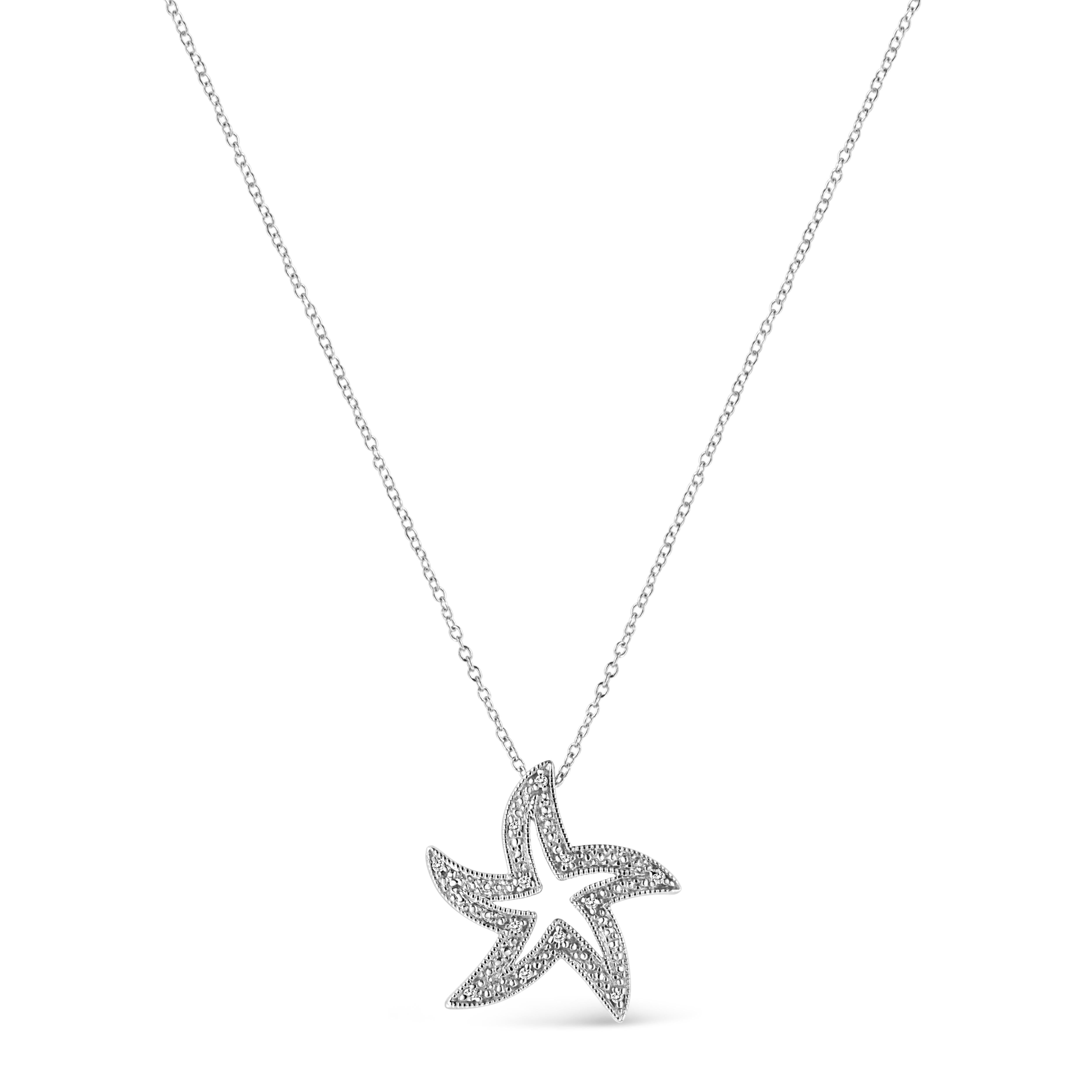 Entice her with starbursts of light-reflecting beauty of this gorgeous diamond star fish pendant crafted in sterling silver. This open design star fish is adorn with 12 prong set sparkling single cut diamonds. This dainty pendant hangs from a cable