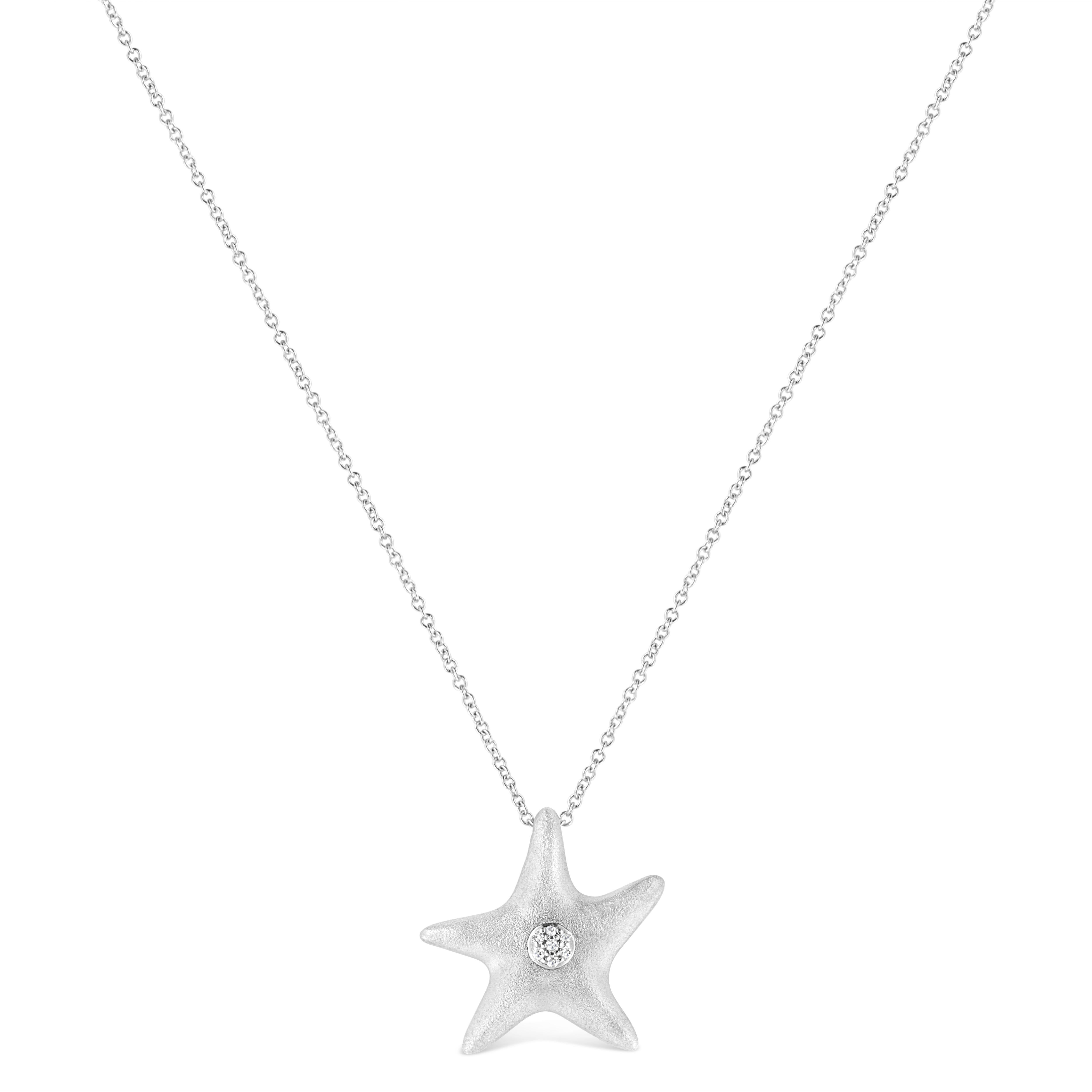 Beguile her with starbursts of light-reflecting beauty of this gorgeous diamond star fish pendant crafted in sterling silver. The center of the star fish is adorn with a cluster of 7 prong set shimmering single cut diamonds. This dainty pendant