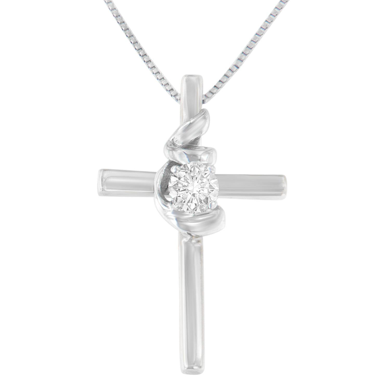 Celebrate your divinity with this elegant .925 sterling silver cross pendant embellished with a natural, round-cut diamond, framed by a ribbon motif. This authentic design is crafted of real 92.5% sterling silver that has been electro-coated with
