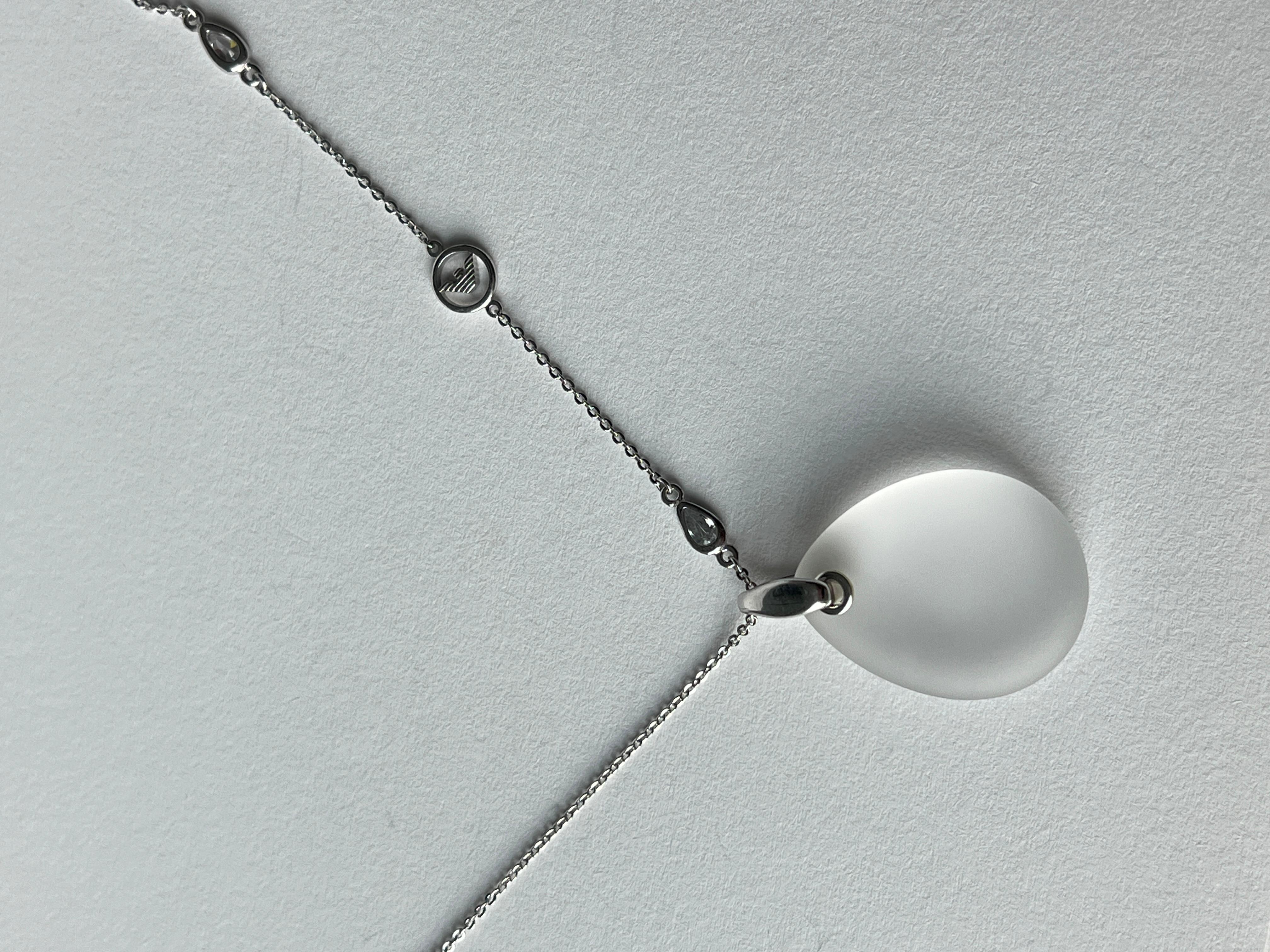 Elegant solid sterling silver necklace with a matte quartz pendant from Emporio Armani. 

Solid feel, sophisticated and unique. 

Weight: 0.49 oz (13.9 grams)
Pendant size: 1.4 X 0.9 inches
Necklace length: 18 inches ( adjustable at 16 inches as