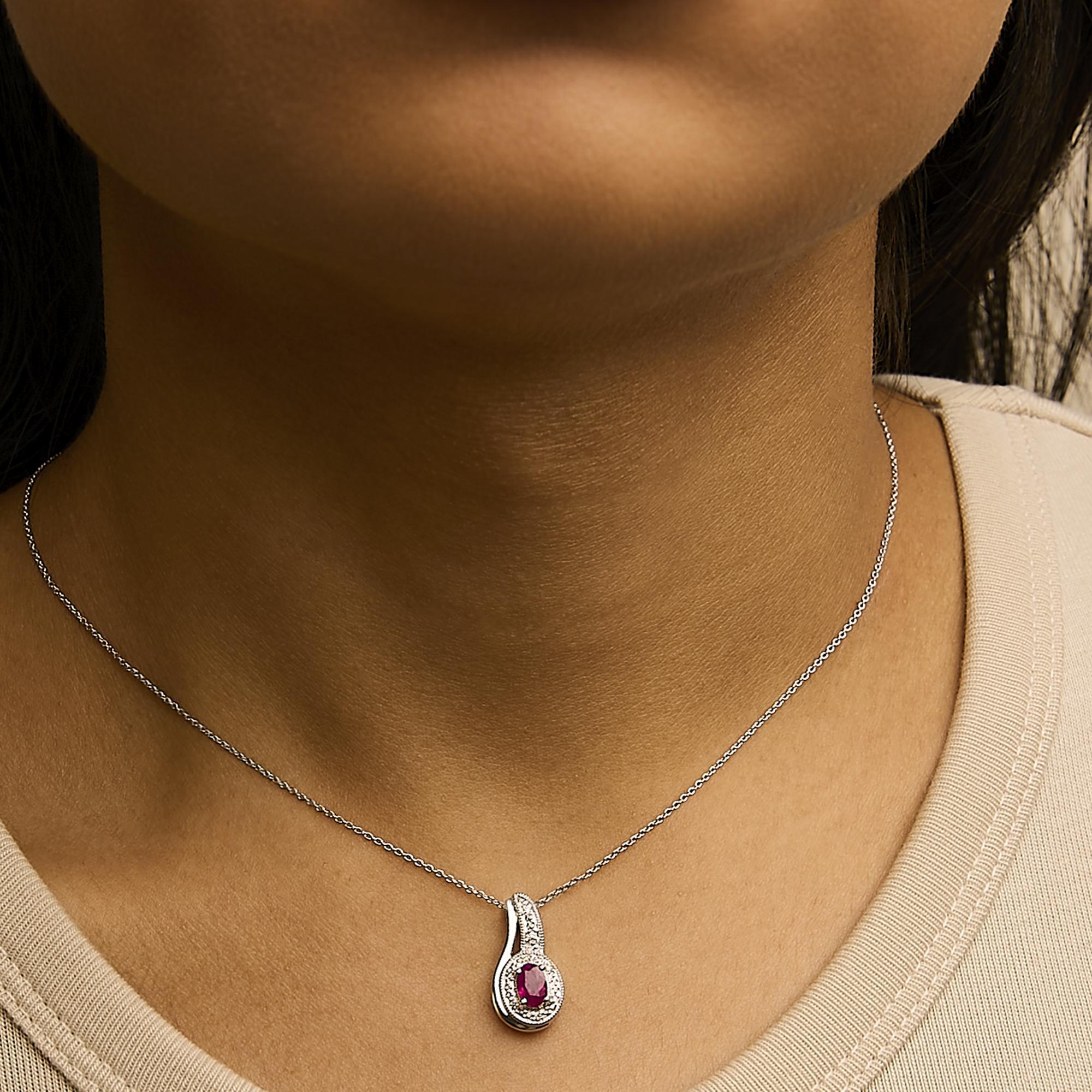 Oval Cut .925 Sterling Silver Red Ruby and Diamond Accent Milgrain Swirl Pendant Necklace For Sale