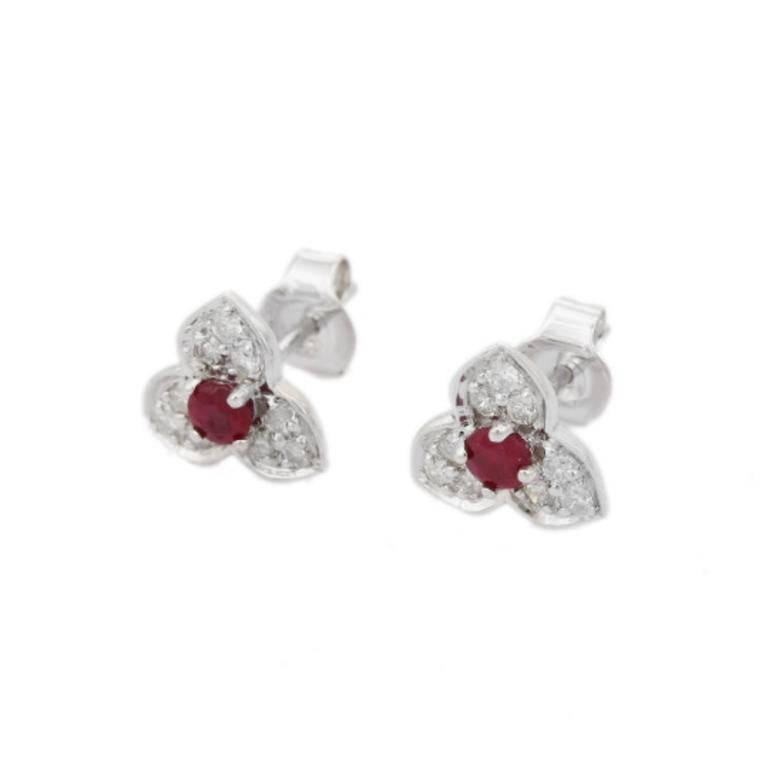 These gorgeous Ruby Everyday Stud Flower Earrings Gift for Mom are crafted from the finest material and adorned with dazzling ruby and diamond where ruby enhances confidence and improves leadership qualities. 
These stud earrings are perfect