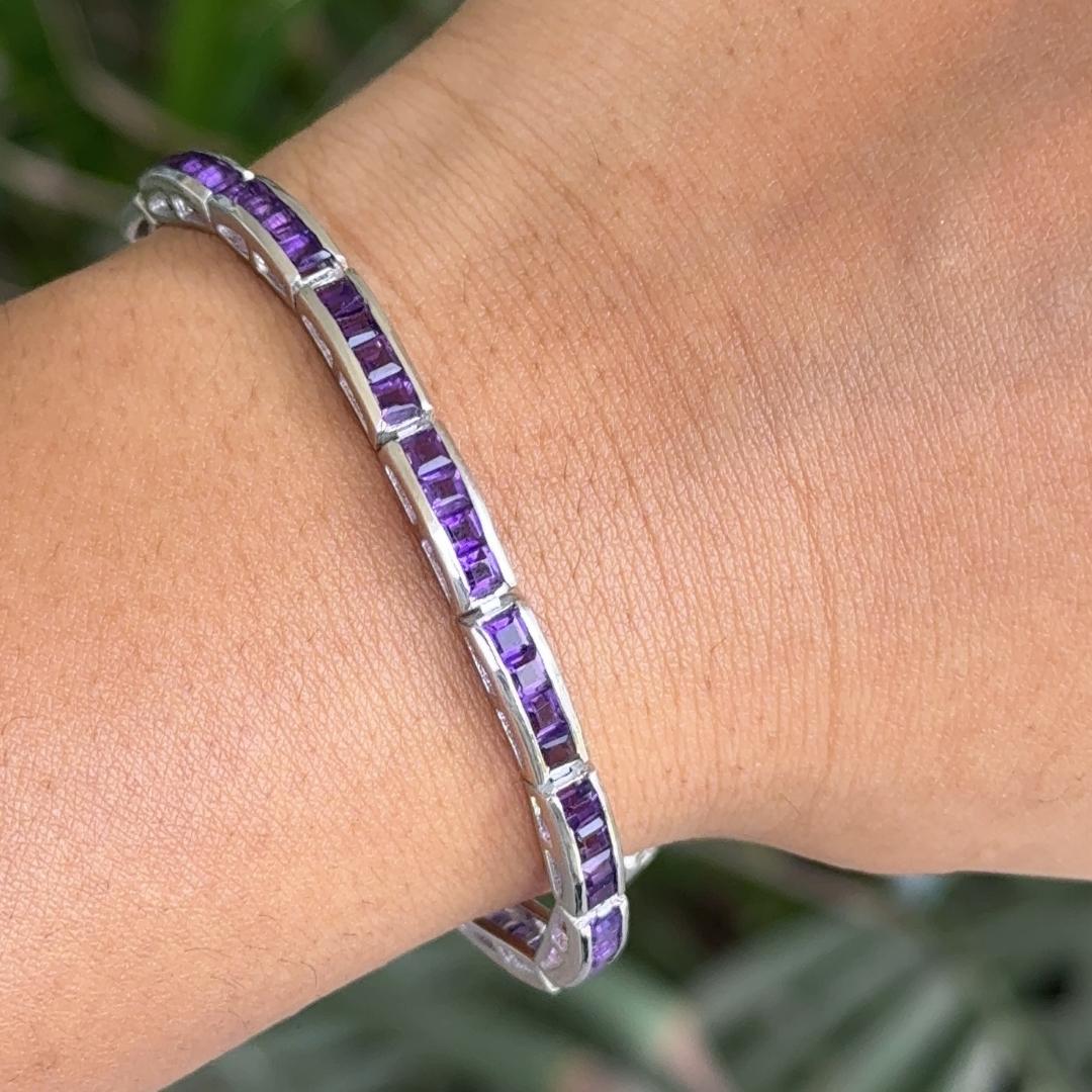 925 Sterling Silver Square Amethyst Gemstone Tennis Bracelet in sterling silver showcases endlessly sparkling natural amethyst, weighing 6.5 carat. It measures 7.25 inches long in length.
Natural Amethyst stimulate concentration and reduces