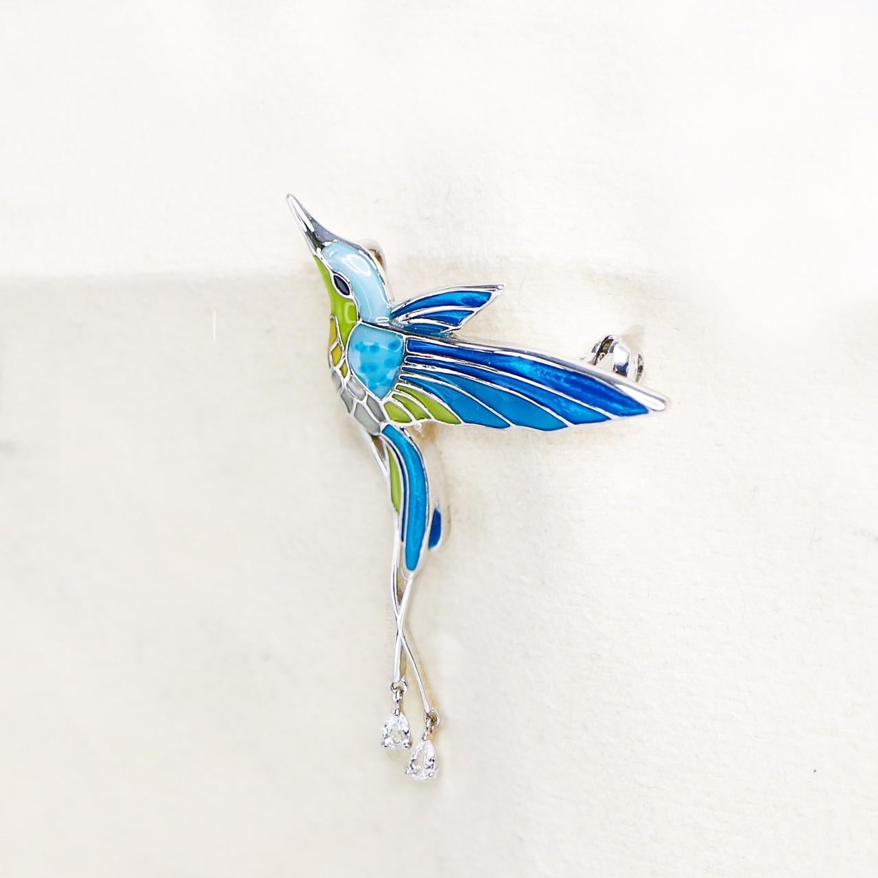 *925 Sterling Silver Swallow Enamel Antique Stud Brooch*

Swallow shape enamel on the white gold plated 925 sterling silver band with fine workmanship and enamel art. 

The earrings combine fashion and classic design ideas and are suitable for