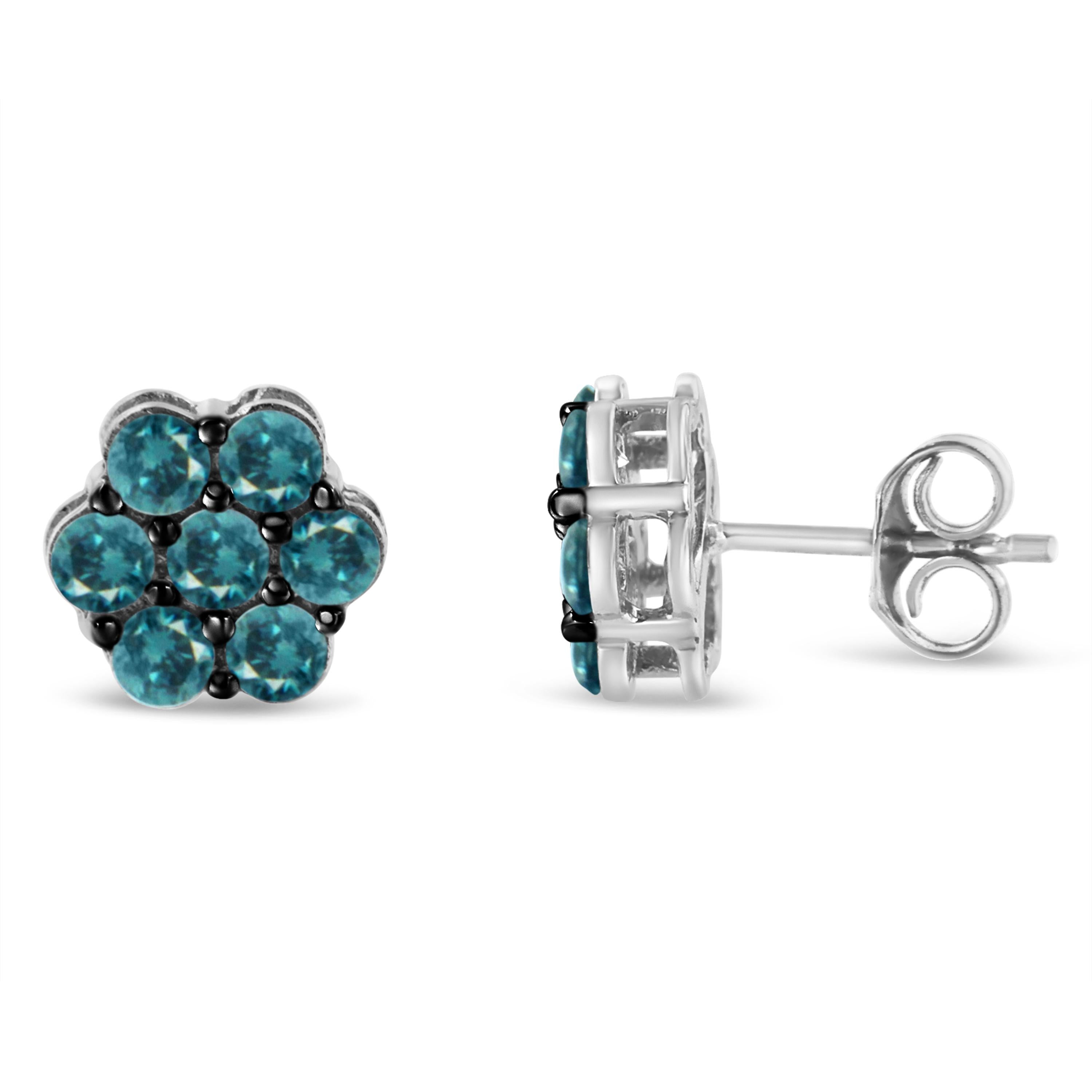 Every onlooker will feel like that he is diving into a deep blue sea when he will have a look at these floral stud earrings. The pair of earrings are made using sterling silver and embellished with treated blue rose cut diamonds. Dazzling yet easy