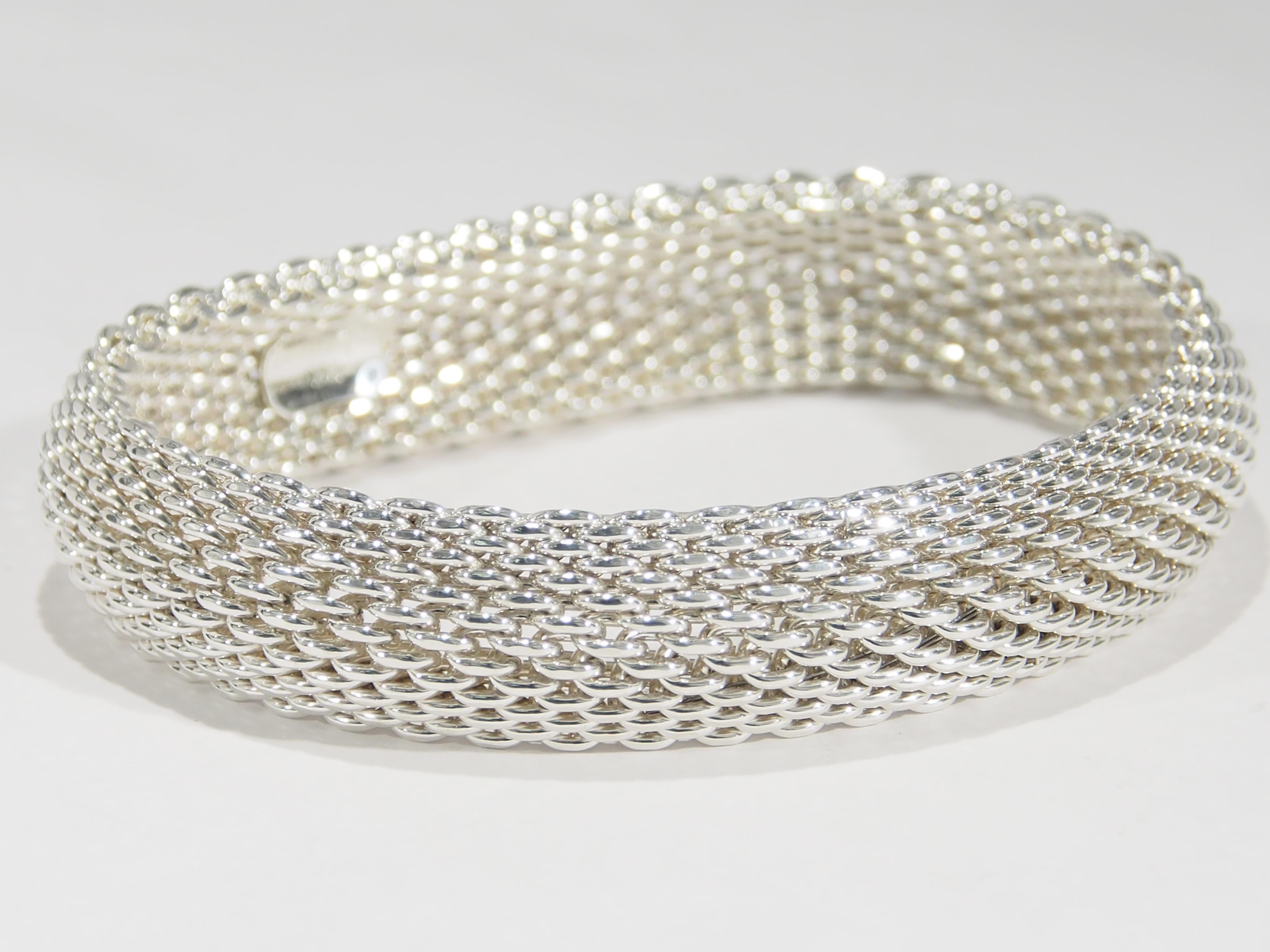 From one of the favorite jewelry designers, Tiffany & Company is this Sterling Silver Mesh Bracelet from their Somerset Collection. This classic Bracelet is 5/8 of an inch in width, a size 7 1/2 and has the 