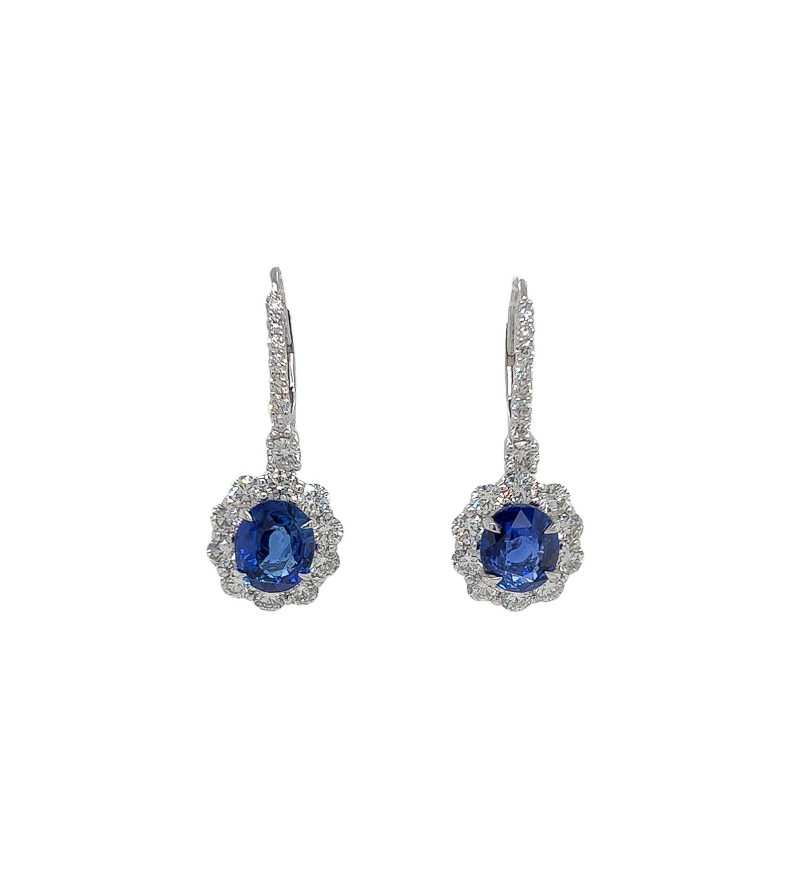 9.26 Total Carat Blue Sapphire and Diamond Drop Earrings in Platinum

This gorgeous pair of Sapphire earrings are sure to draw all eyes on you. It is created with 6.19 Carats Oval Sapphires, surrounded by a halo and drop of round diamonds totaling a