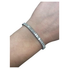9,27 Karat Smaragdschliff Diamant-Tennisarmband
