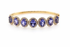 Bracciale a raggiera ovale con tanzanite e diamanti da 9,29 carati in oro giallo 14K