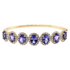 Bracciale a raggiera ovale con tanzanite e diamanti da 9,29 carati in oro giallo 14K