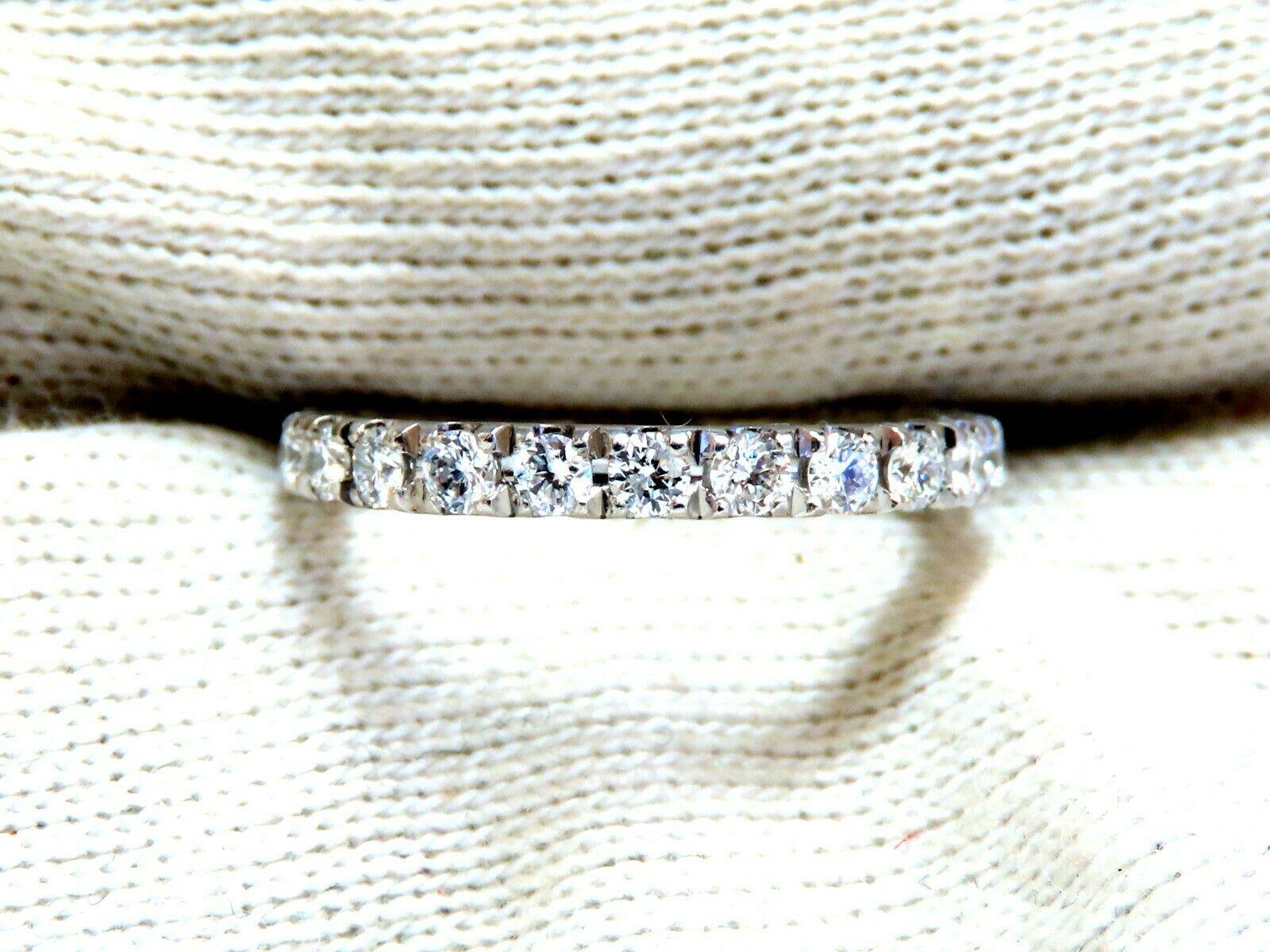 .92ct. Natural Diamonds eternity band 
Round, Brilliant Cuts

F-G color 

Vs-2 clarity


Sharing Prong

2.4 grams

2.1mm wide 

2.2mm depth

Size 3.75 and may not resize.


14kt white gold