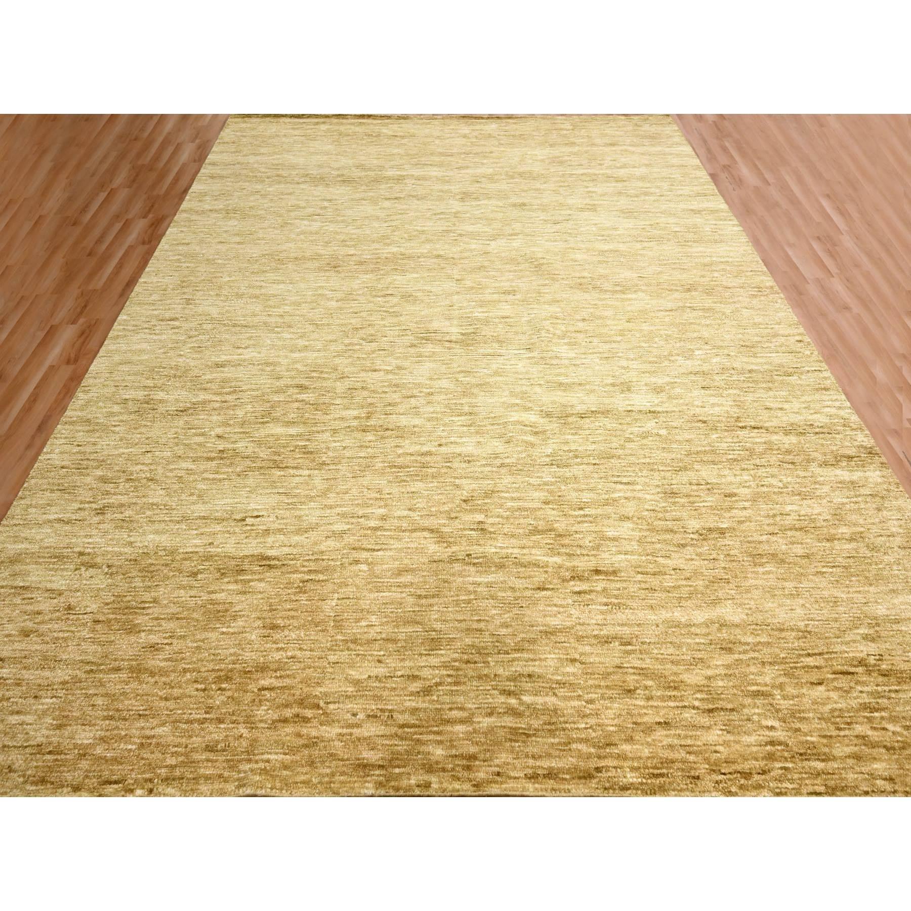 Golden Yellow, Modern Plain Design, Densely Woven, Pure Wool, Hand Knotted, Oriental Rug
Primary materials: Wool
Latex: No Pile 
height: 0.25 Inches
Style: Contemporary
Primary color: Yellow
Secondary colors: None
Pattern: Oriental
