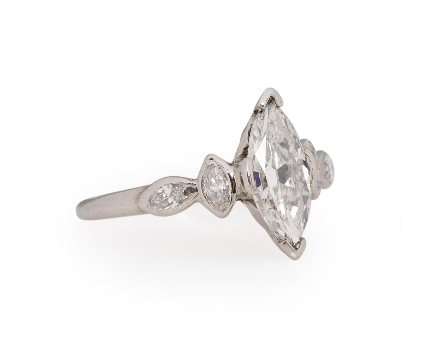 Ring Size: 5
Metal Type: Platinum [Hallmarked, and Tested]
Weight: 3.5 grams

Center Diamond Details:
Weight: .93carat
Cut: Antique Marquise
Color: G
Clarity: SI2

Side Stone Details:
Weight: .20carat, total weight
Cut: Antique Marquise
Color: