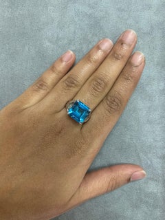 Sunita Nahata Blue Topaz 9.30ct. Fancy Ring in 18KWG with Tourmaline & Diamond.