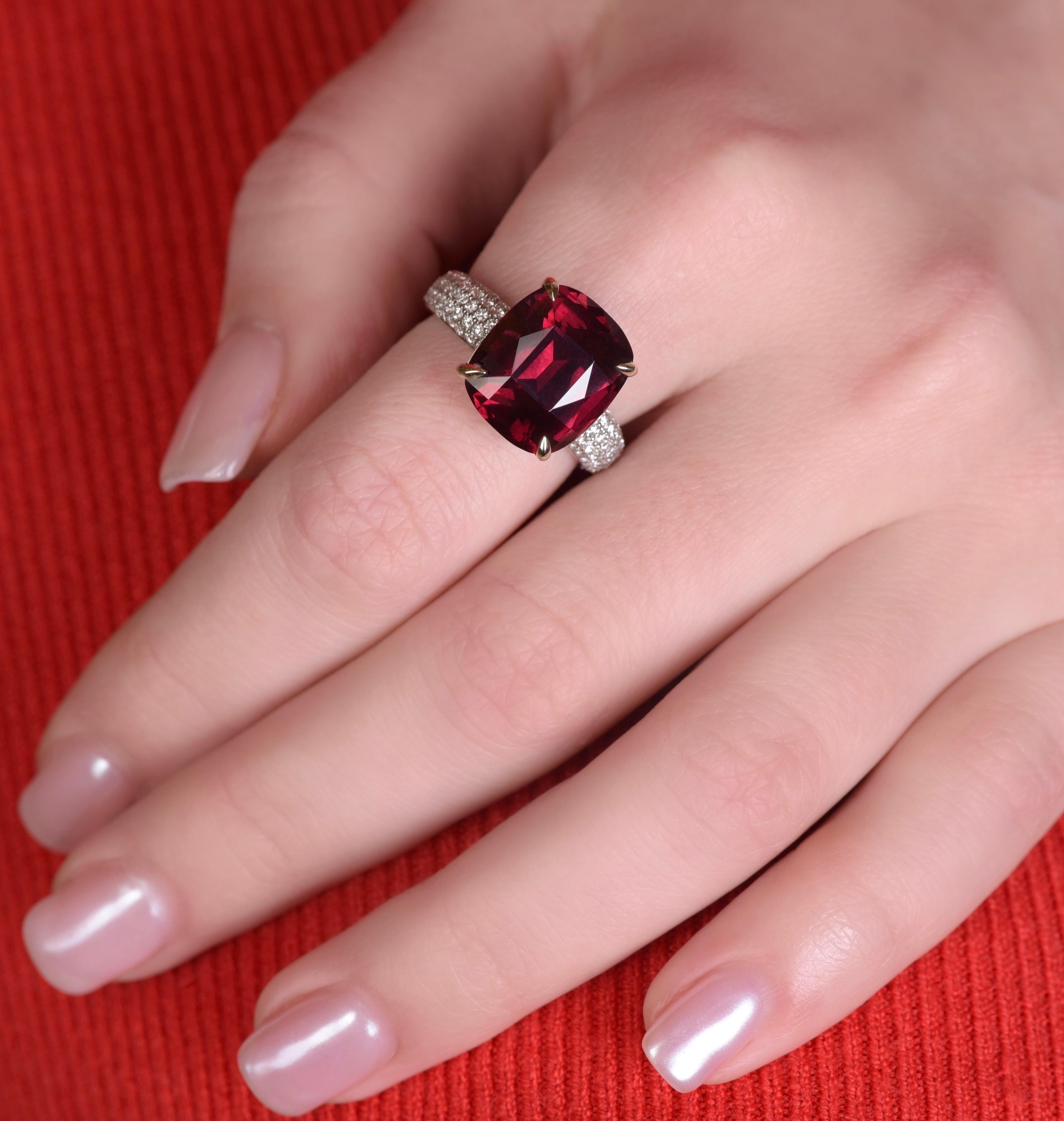 If you would like to have jewelry to capture the attention you should choose rhodolite garnet. The stone is so beautiful and noble that it will impress everybody for sure. Especially if you will add some diamonds. 
This ring would be looking like a