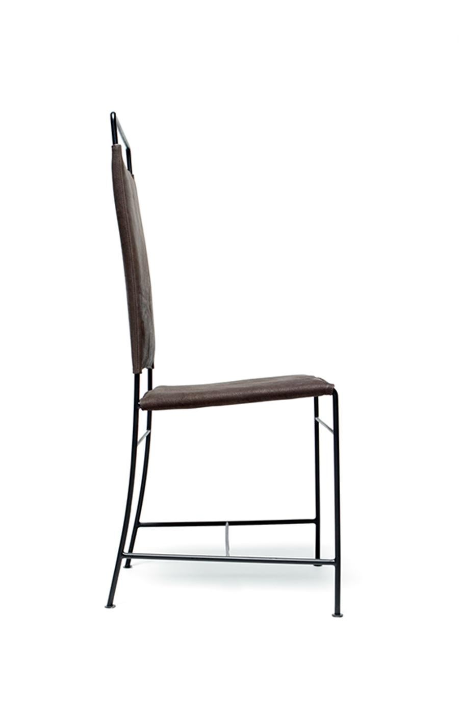 The 93° Chair features a steel frame with a tight upholstered seat and back.

Made to order and handcrafted in Germany. Available in brown leather. Metal frame available in blackened or stainless steel. 

COL and custom metal finish options also