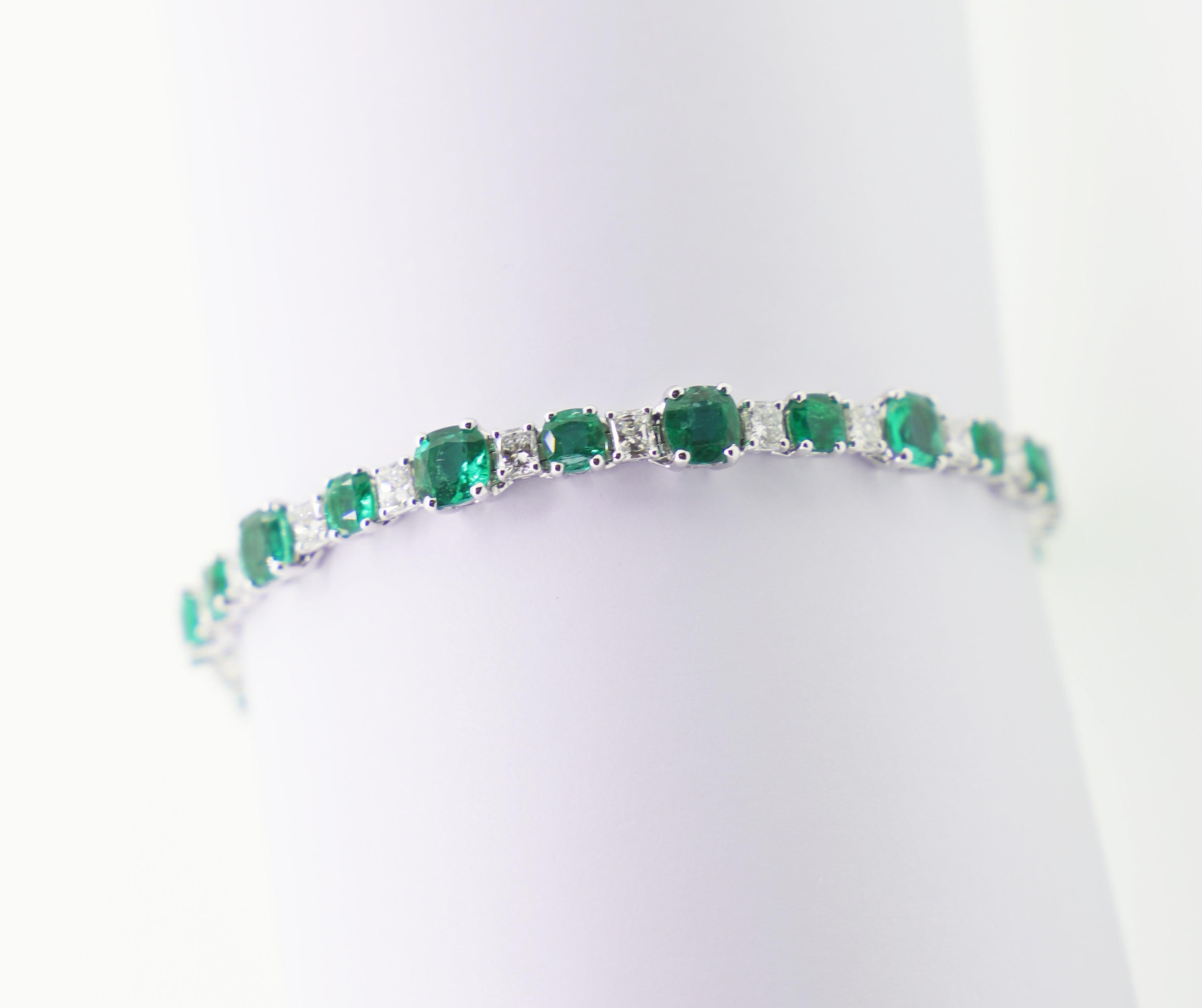 Elegant and Essential Tennis Bracelet featuring  24 Vibrant Green Cushion Shape Emeralds, for 9.30 Carat Total, spaced out by 24 White Radiant Shape Diamonds, for 3.21 Carat Total.
Traditionally, Emerald Stones are believed to benefit the wearer by