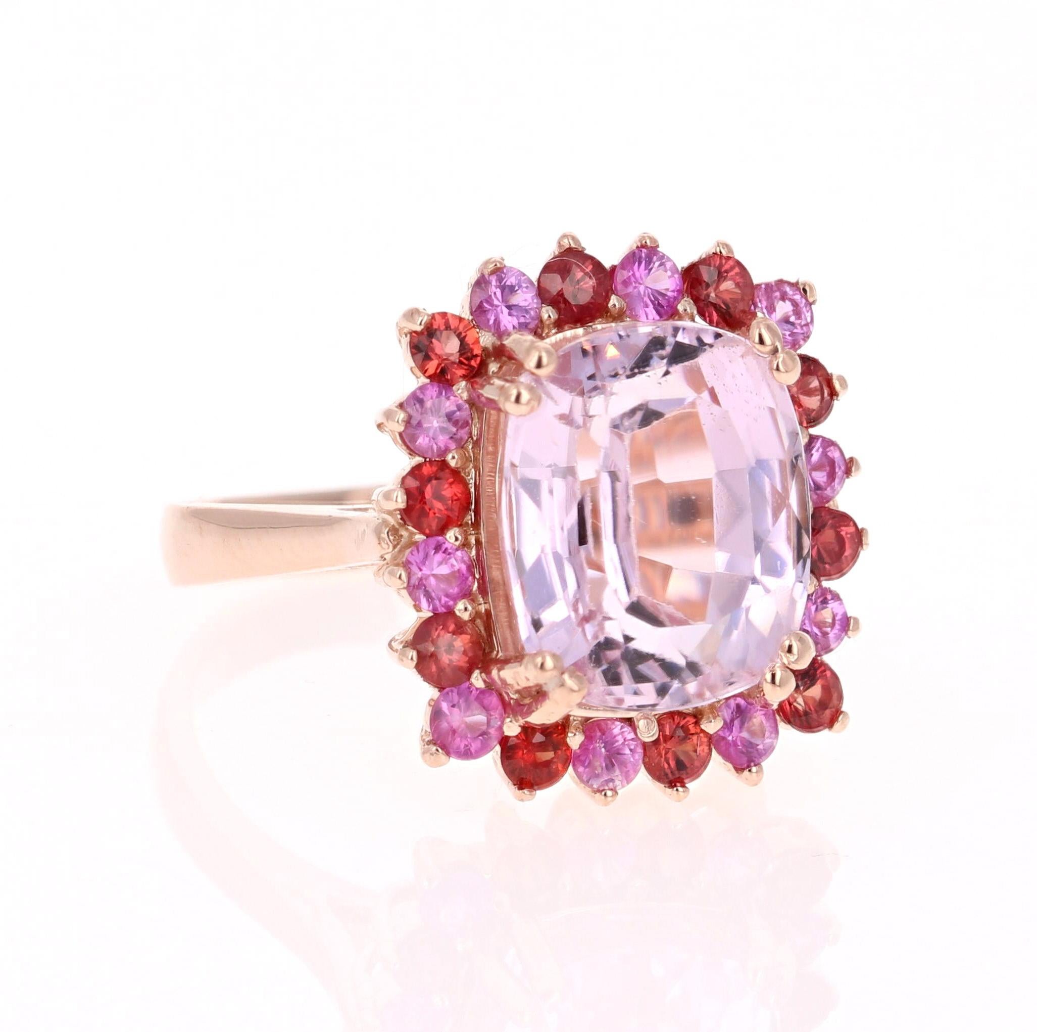 Candy Crush on your Finger!! 

This beautiful ring has a huge Emerald-Cushion Cut 7.96 Carat Kunzite that is set in the center of the ring and is surrounded by 20 Round Cut Pink and Deep Orange-Red Sapphires that weigh 1.34 Carats. The total carat