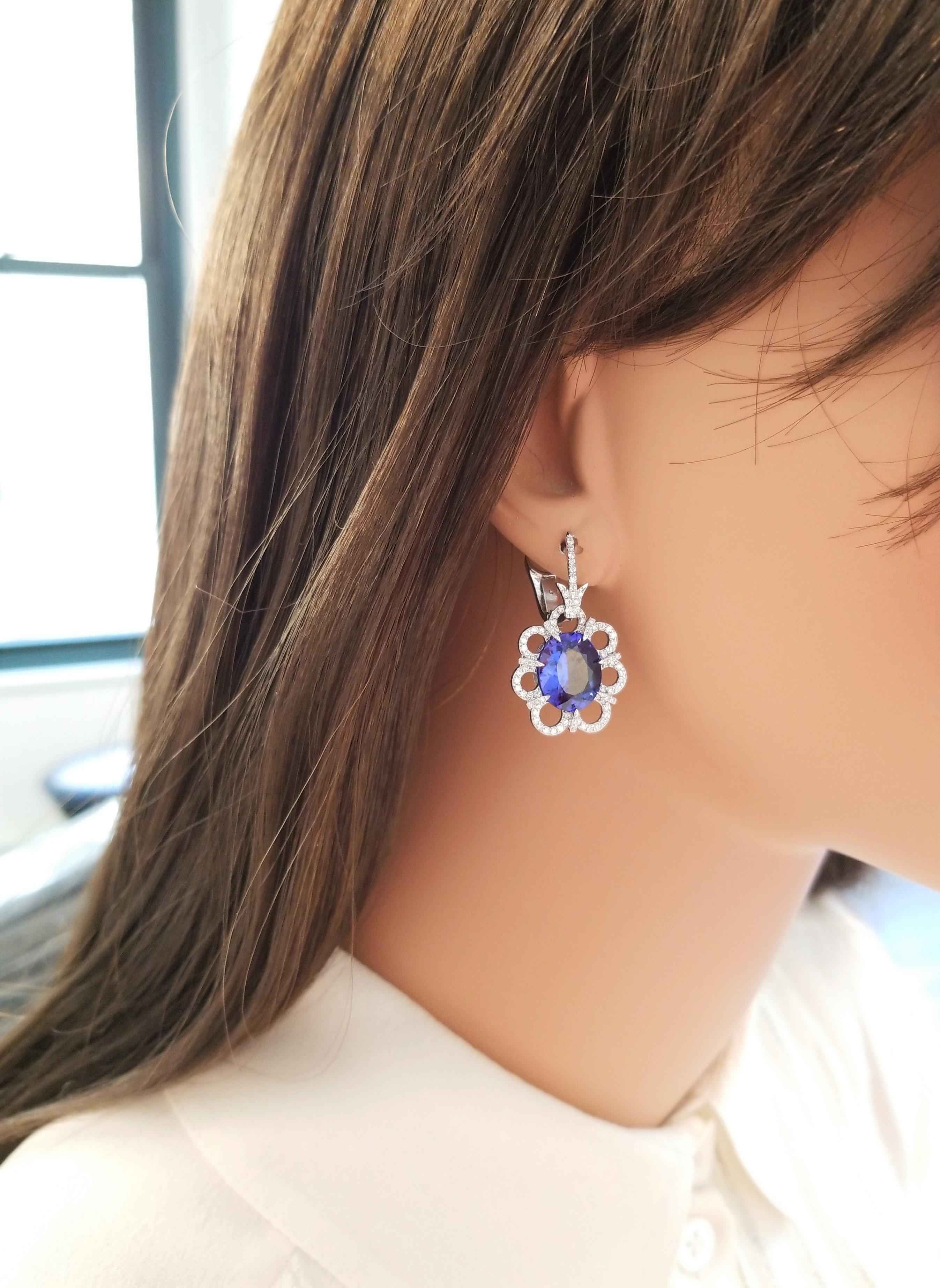 These statement earrings have two oval-cut, vivid blue-violet tanzanites totaling 9.30 carats expertly set into diamond prong settings. The gem source is near the foothills of Mt. Kilimanjaro in Tanzania. The saturation is what you want; its