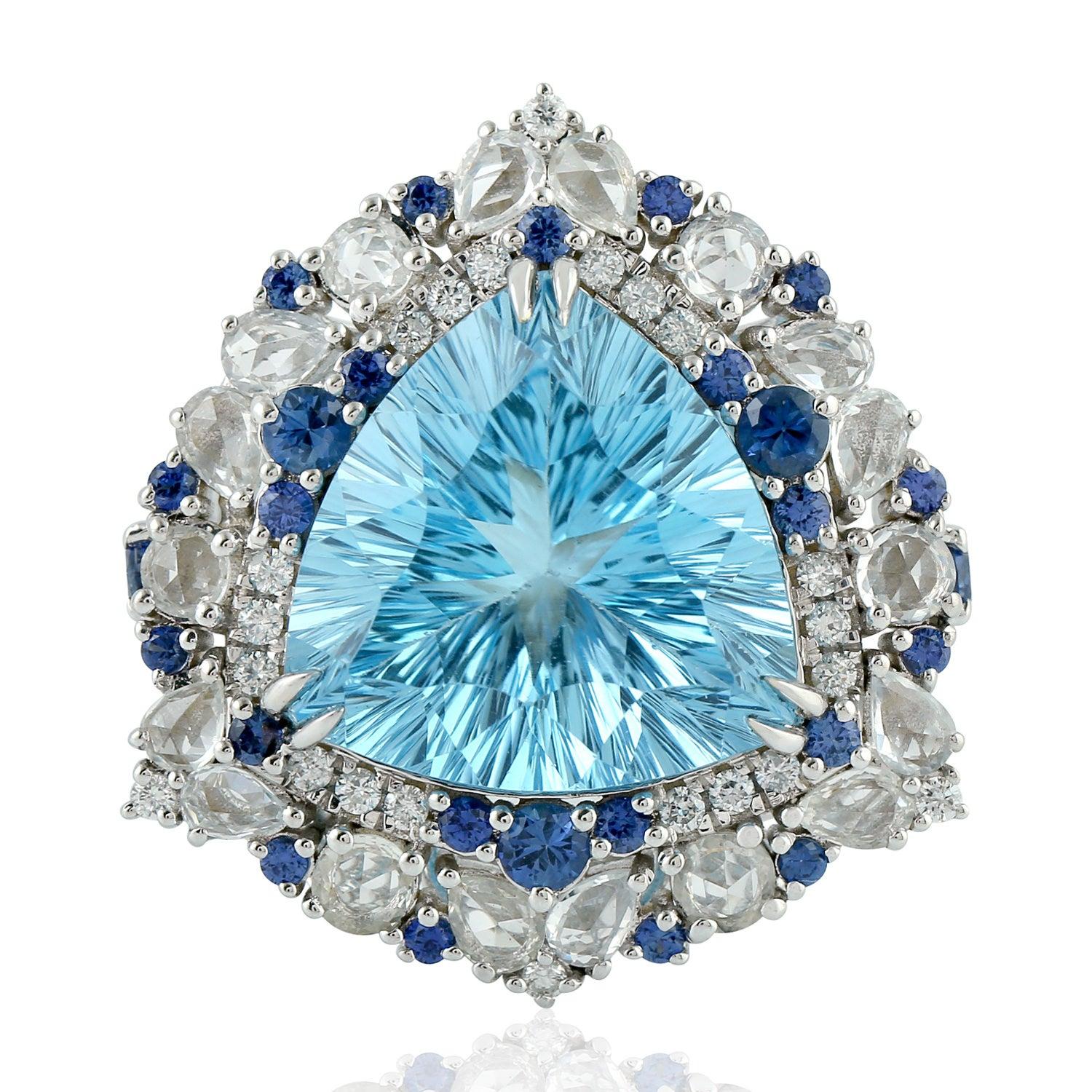 En vente :  Bague en or 18 carats avec topaze bleue 9,31 carats, saphirs et diamants 4