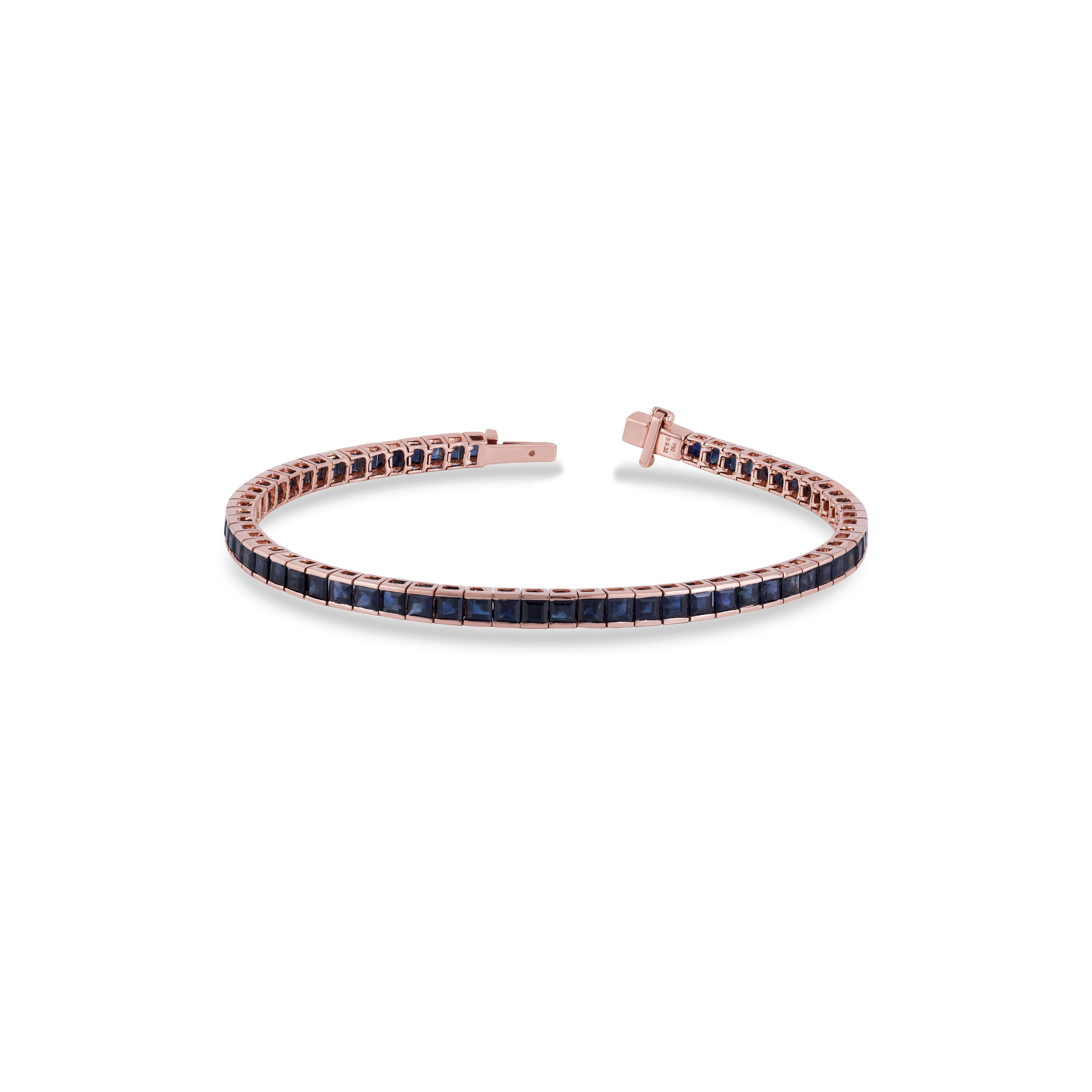 This is an elegant Sapphire bracelet that features 58 pieces of princess cut rubies 11.08 carat in the channel setting, this bracelet entirely made in 18 karat rose gold , this is a classic tennis bracelet.