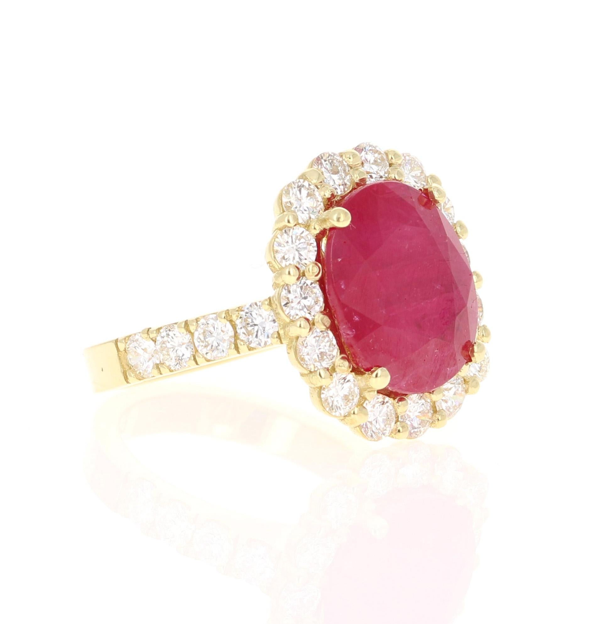 This gorgeous and elegant Ruby & Diamond Ring can be a gorgeous Engagement Ring or a Cocktail Ring. It has a Oval Cut Deep Red Ruby that is 7.47 Carats with a halo of 23 Round Cut Diamonds weighing 1.86 Carats. The total carat weight of the ring is