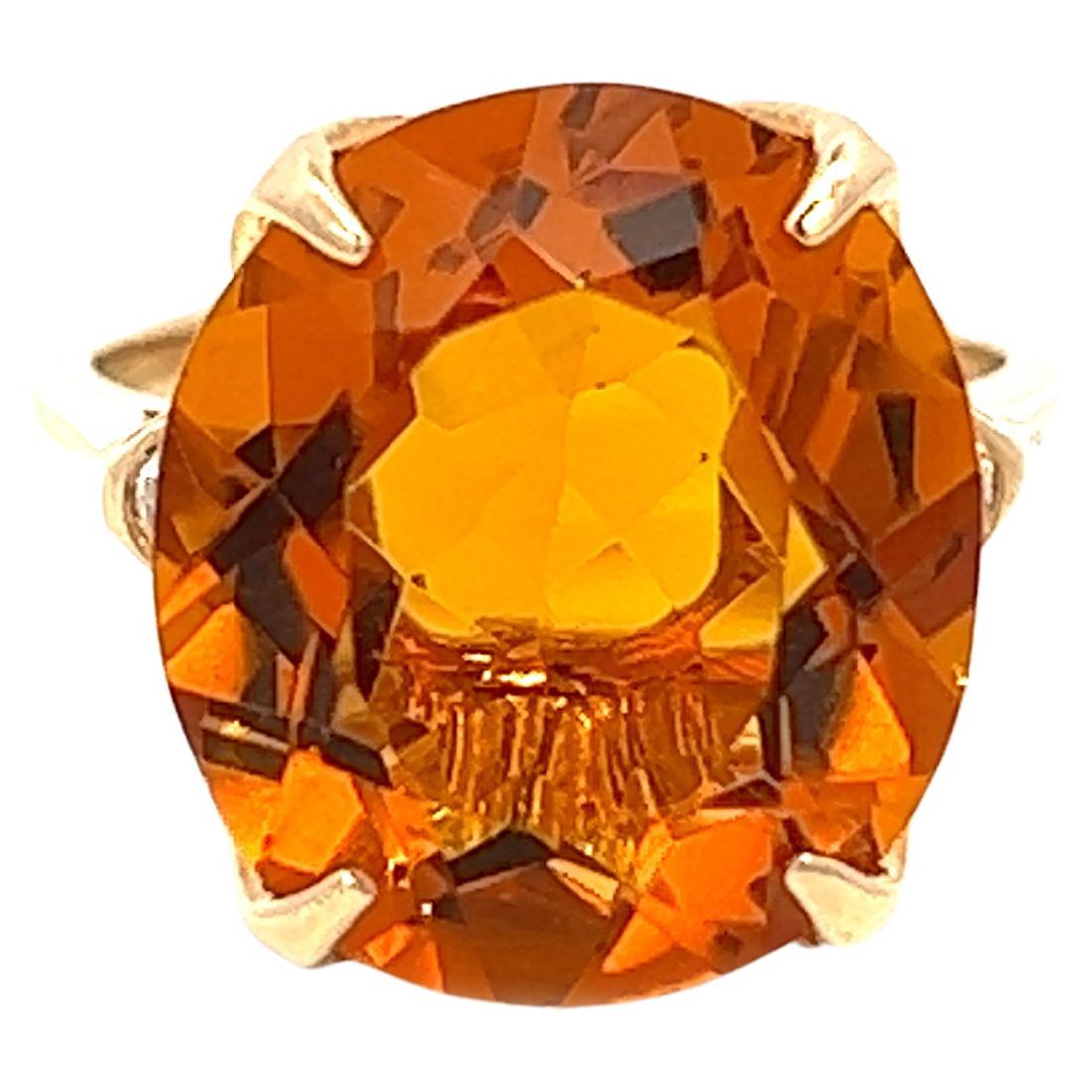 Poids total de 9,33 carats, topaze orange et diamants sertis en 14 carats