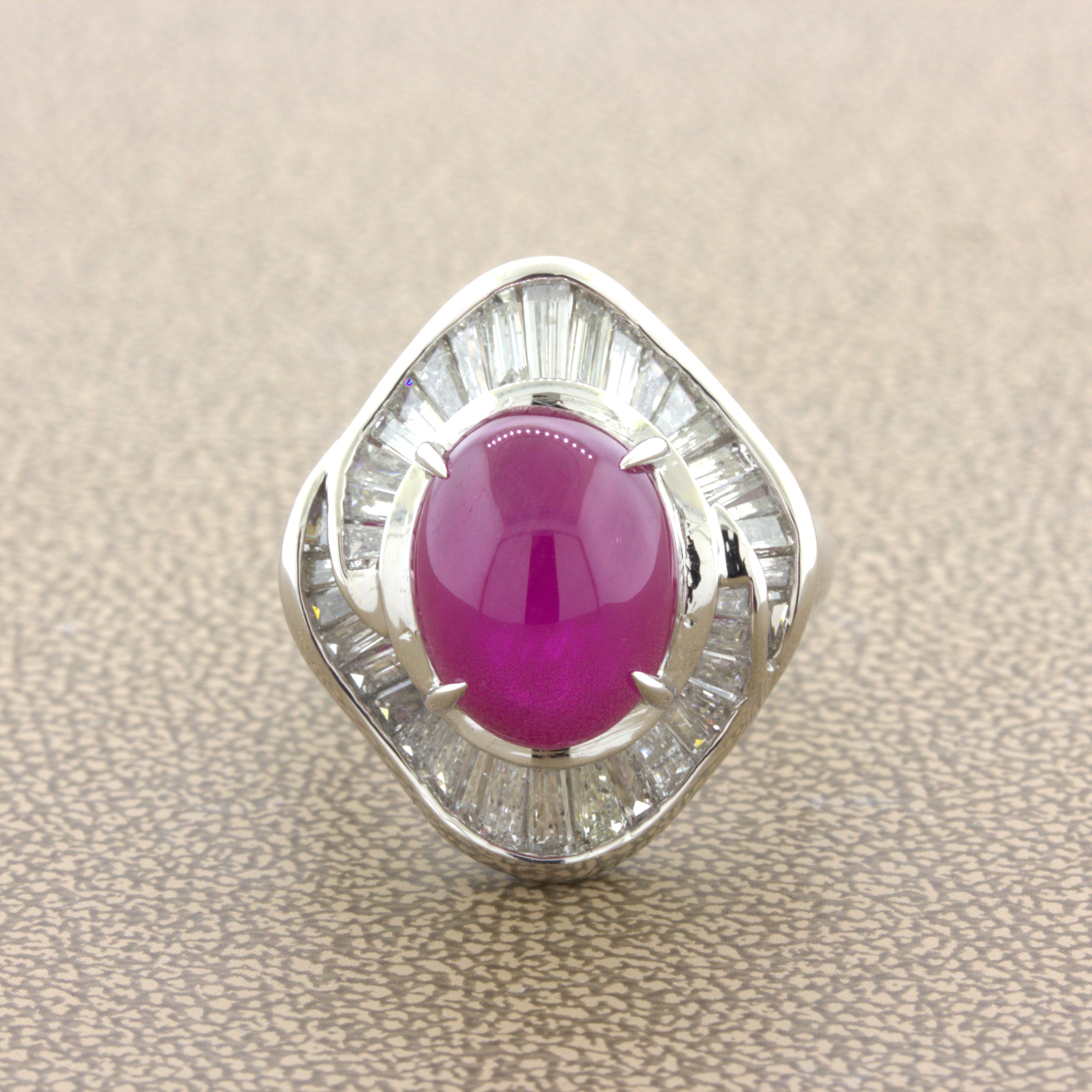 A significant and gorgeous platinum ring featuring a fine 9.34 carat natural ruby. It is cabochon-shaped with an even bright intense red color that glows in the light. It is complemented by 2.02 carats of baguette-cut diamonds set around the ruby in