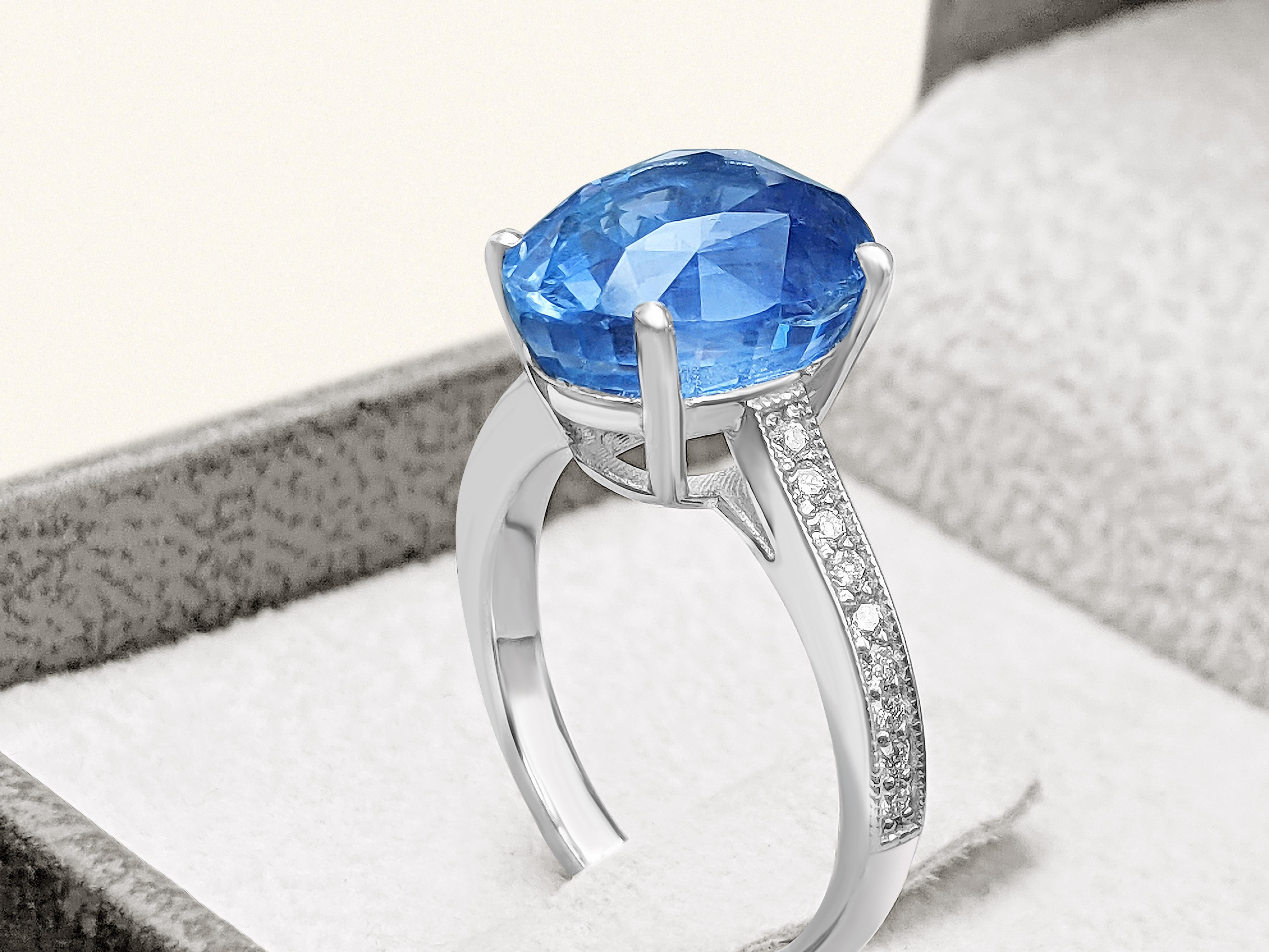 Oval Cut 9.35 Carat Blue Sapphire and Diamonds Ring