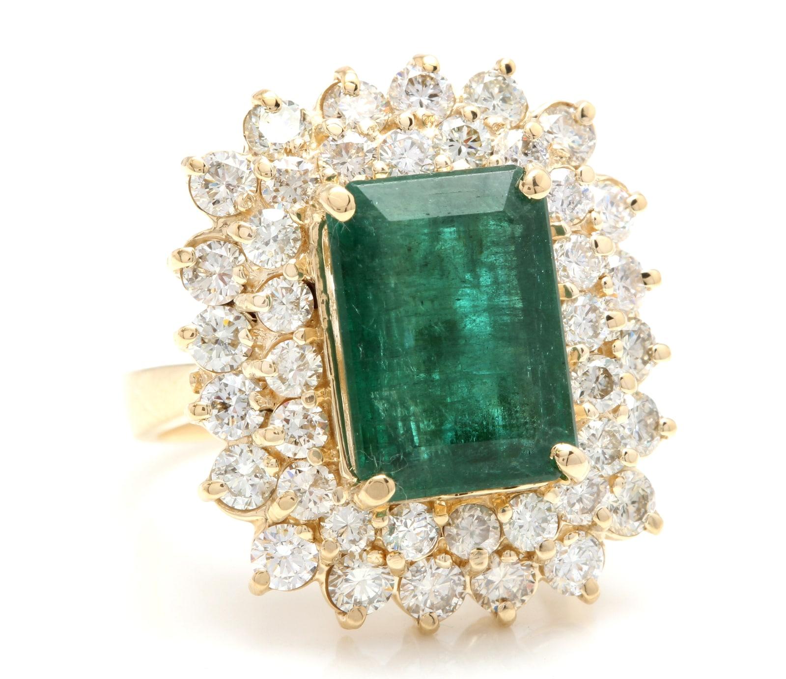 9.35 Carats Natural Emerald and Diamond 14K Solid Yellow Gold Ring

Total Natural Green Emerald Weight is: Approx. 7.00 Carats (transparent) (Oil Treated)

Emerald Measures: Approx. 12.00 x 9.50mm

Natural Round Diamonds Weight: Approx. 2.35 Carats