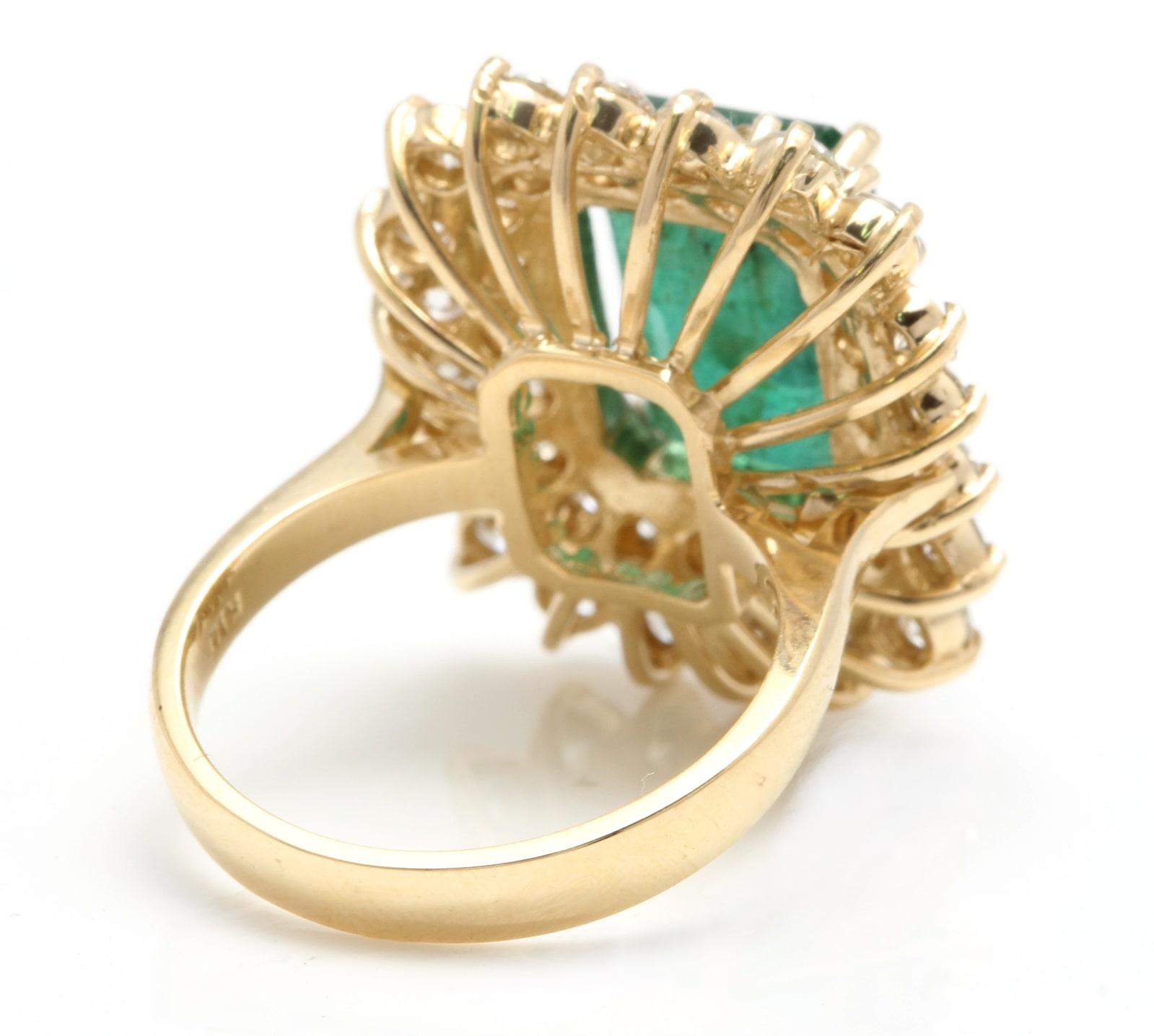 emerald and diamond yellow gold ring
