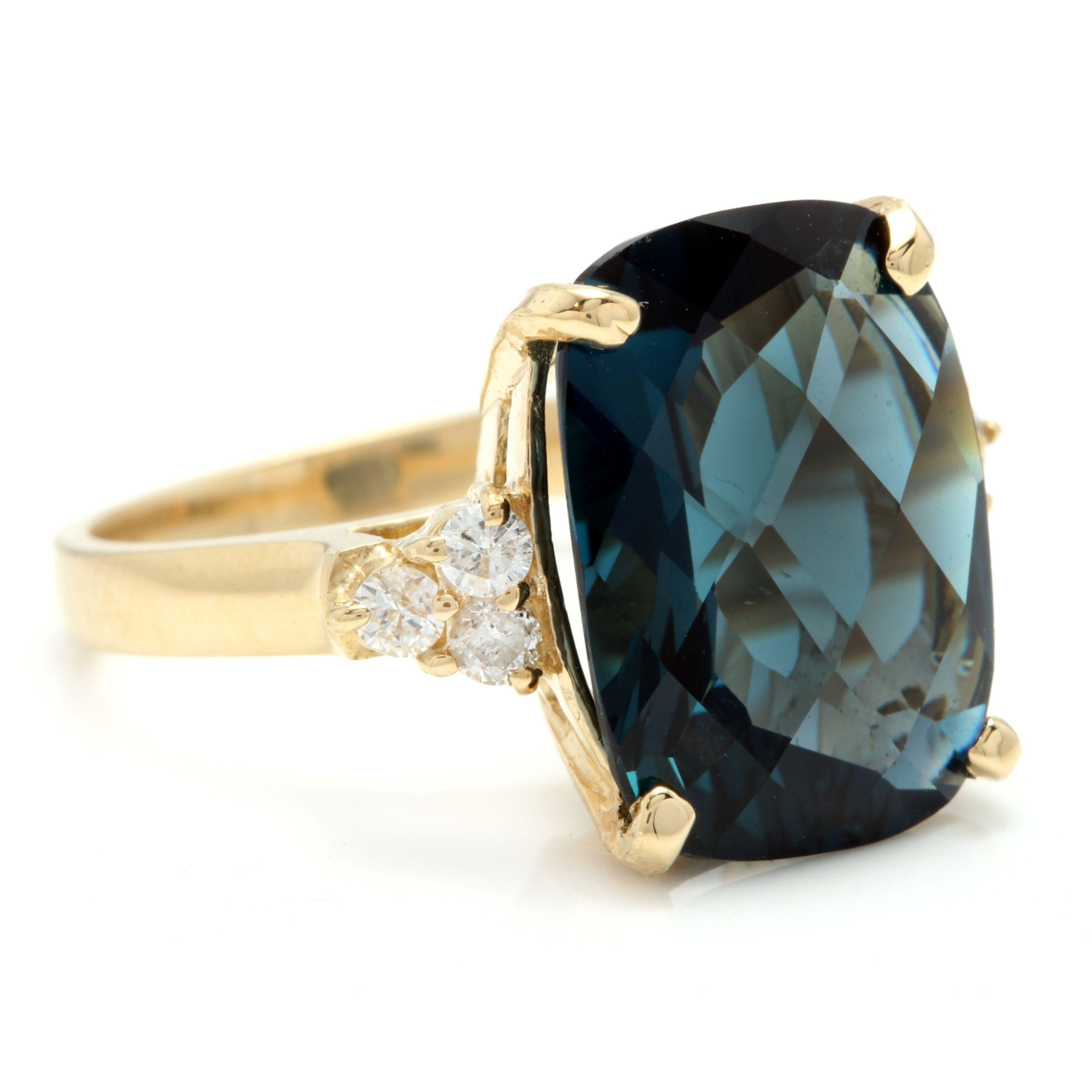 9.35 Carats Natural Impressive London Blue Topaz and Diamond 14K Yellow Gold Ring

Total Natural London Blue Topaz Weight: Approx. 9.00 Carats

London Blue Topaz Measures: 16 x 12mm

Natural Round Diamonds Weight: 0.35 Carats (color G-H / Clarity