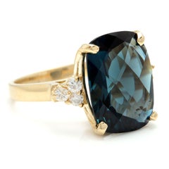 9.35 Carat Natural Impressive London Blue Topaz and Diamond 14 Karat Gold Ring