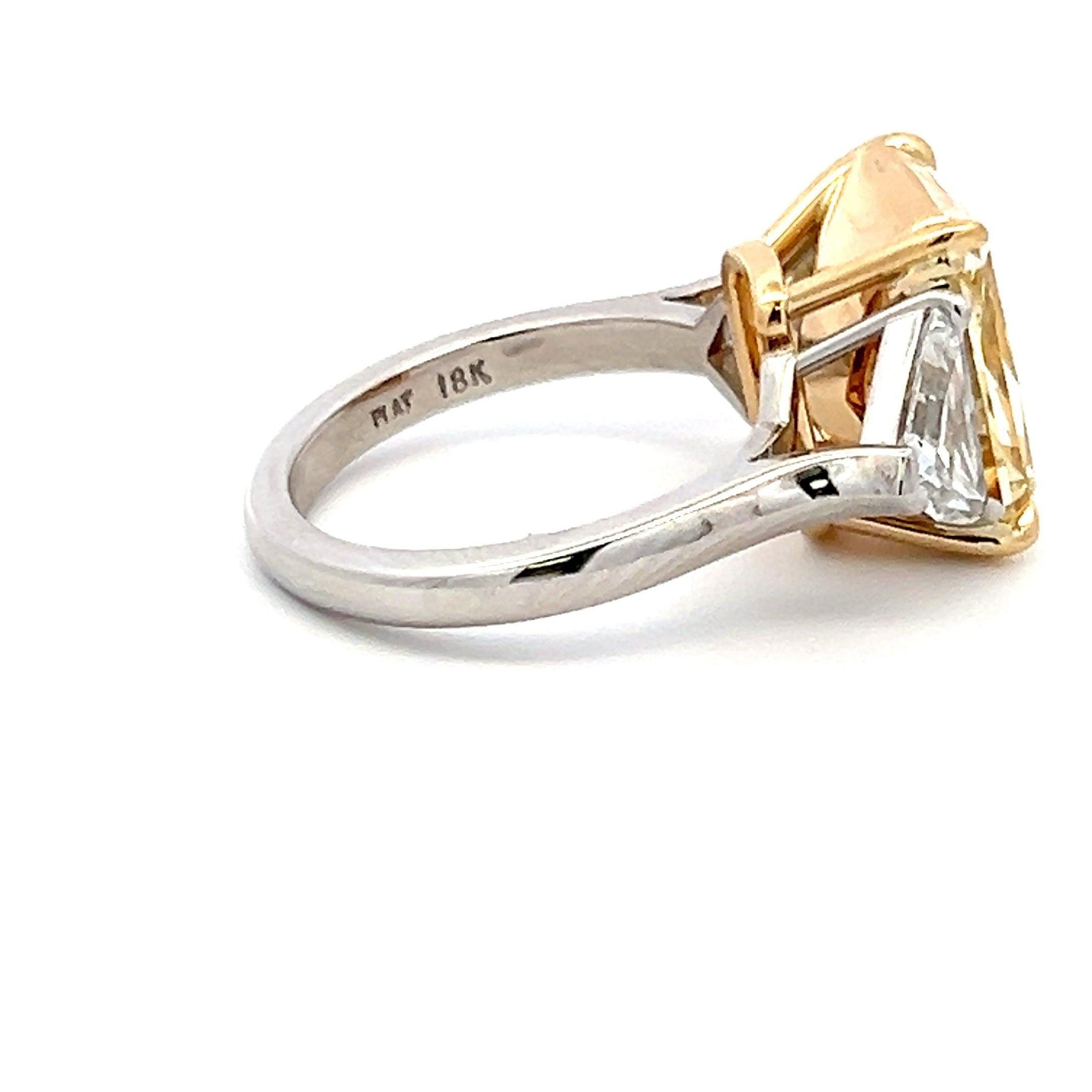 Women's 9.35 Carat Radiant Fancy Yellow and Shield Diamond Platinum Three-Stone Ring For Sale