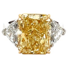9.35 Carat Radiant Fancy Yellow and Shield Diamond Platinum Three-Stone Ring