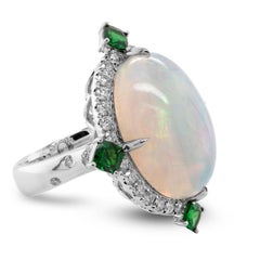 9.35 Carat Sunset Color Play Opal Tsavorite And 0.71 carats White Diamond Ring