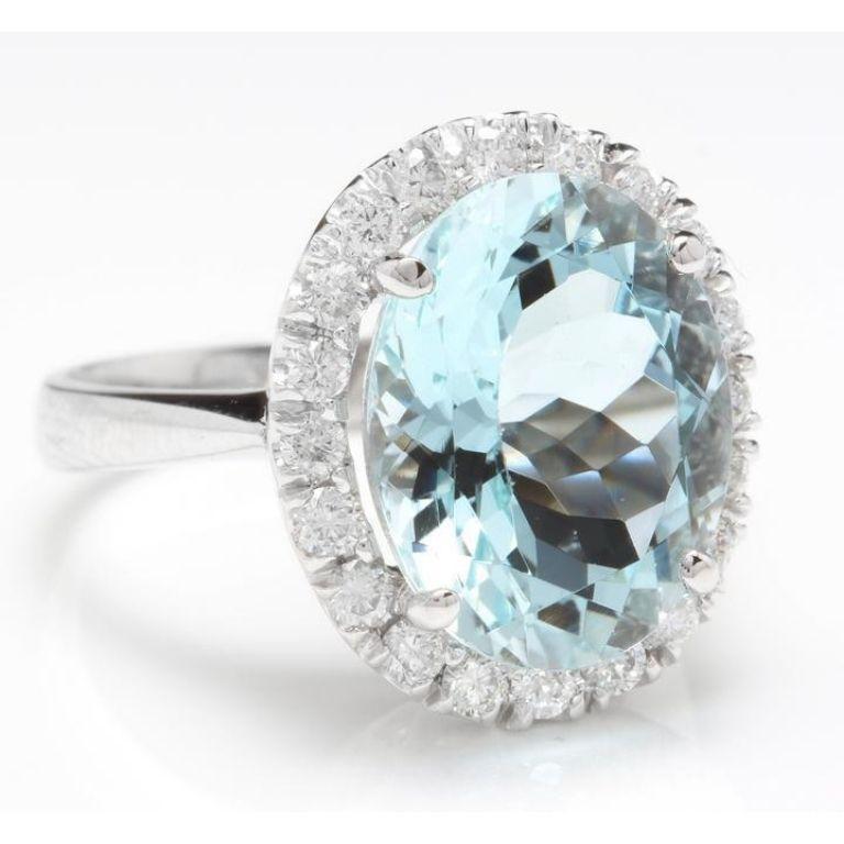 9.35 Carats Natural Aquamarine and Diamond 14K Solid White Gold Ring

Total Natural Oval Cut Aquamarine Weights: Approx. 8.50 Carats

Aquamarine Measures: Approx. 13.80 x 10.92mm

Natural Round Diamonds Weight: .85 Carats (color G-H / Clarity