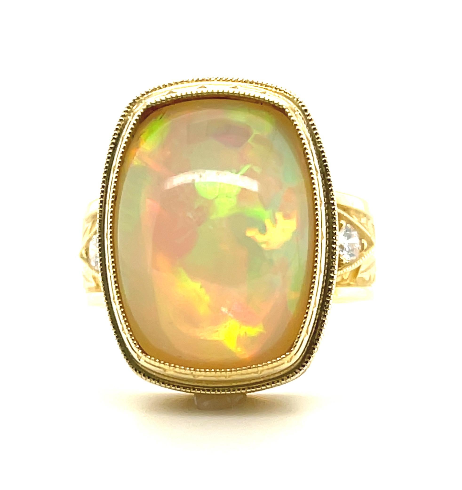 This spectacular ring can be worn on any finger and will complement every color in your wardrobe! It features a large, cushion-shaped Ethiopian opal that weighs 9.37 carats and is of exceptionally fine quality. This phenomenal gemstone displays all