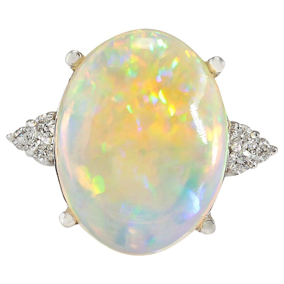 Bague en or blanc 14 carats avec opale naturelle et diamant 
